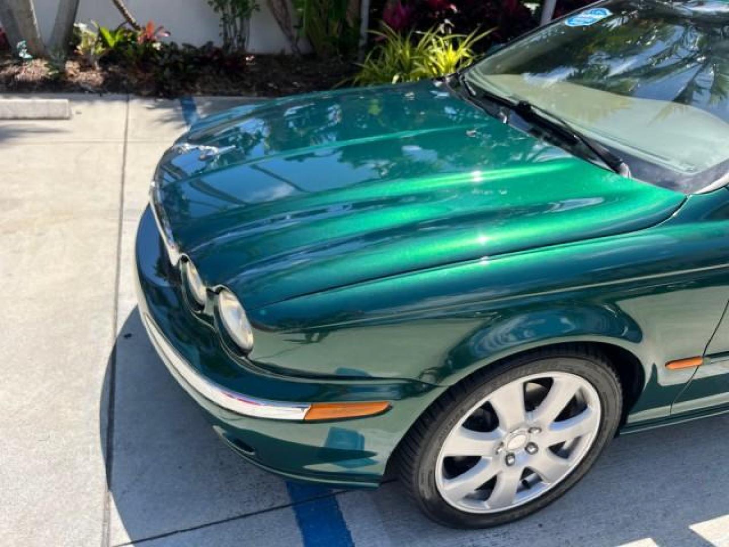 2006 Jaguar Racing Green /Ivory Jaguar X-TYPE AWD LOW MILES 61,609 (SAJWA51A56W) with an 3.0L DOHC SMPI 24-Valve V6 Engine engine, Automatic transmission, located at 4701 North Dixie Hwy, Pompano Beach, FL, 33064, (954) 422-2889, 26.240938, -80.123474 - OUR WEBPAGE FLORIDACARS1.COM HAS OVER 100 PHOTOS AND FREE CARFAX LINK 2006 JAGUAR X-TYPE 3.0L NEW $40,855 ROAD READY VIN: SAJWA51A56WE96399 NO ACCIDENTS NO RECALLS SEDAN 4 DR FLORIDA OWNER 3.0L V6 3.0L V6 F DOHC PARK SENSORS POWER LEATHER SEATS GASOLINE 7 SERVICE RECORDS POWER SUNROOF/MIRRORS ALL WH - Photo#63