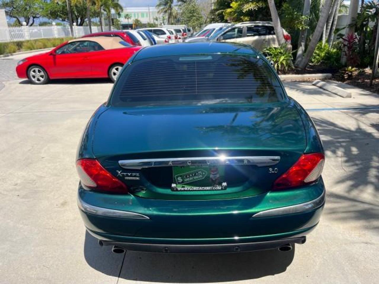 2006 Jaguar Racing Green /Ivory Jaguar X-TYPE AWD LOW MILES 61,609 (SAJWA51A56W) with an 3.0L DOHC SMPI 24-Valve V6 Engine engine, Automatic transmission, located at 4701 North Dixie Hwy, Pompano Beach, FL, 33064, (954) 422-2889, 26.240938, -80.123474 - OUR WEBPAGE FLORIDACARS1.COM HAS OVER 100 PHOTOS AND FREE CARFAX LINK 2006 JAGUAR X-TYPE 3.0L NEW $40,855 ROAD READY VIN: SAJWA51A56WE96399 NO ACCIDENTS NO RECALLS SEDAN 4 DR FLORIDA OWNER 3.0L V6 3.0L V6 F DOHC PARK SENSORS POWER LEATHER SEATS GASOLINE 7 SERVICE RECORDS POWER SUNROOF/MIRRORS ALL WH - Photo#74