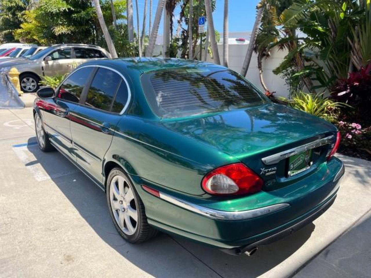 2006 Jaguar Racing Green /Ivory Jaguar X-TYPE AWD LOW MILES 61,609 (SAJWA51A56W) with an 3.0L DOHC SMPI 24-Valve V6 Engine engine, Automatic transmission, located at 4701 North Dixie Hwy, Pompano Beach, FL, 33064, (954) 422-2889, 26.240938, -80.123474 - OUR WEBPAGE FLORIDACARS1.COM HAS OVER 100 PHOTOS AND FREE CARFAX LINK 2006 JAGUAR X-TYPE 3.0L NEW $40,855 ROAD READY VIN: SAJWA51A56WE96399 NO ACCIDENTS NO RECALLS SEDAN 4 DR FLORIDA OWNER 3.0L V6 3.0L V6 F DOHC PARK SENSORS POWER LEATHER SEATS GASOLINE 7 SERVICE RECORDS POWER SUNROOF/MIRRORS ALL WH - Photo#75