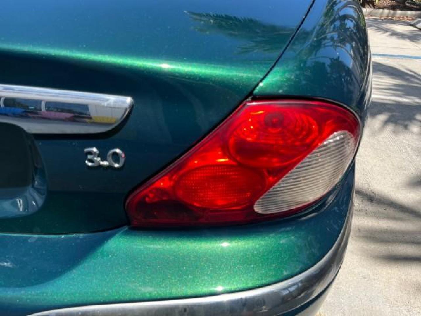2006 Jaguar Racing Green /Ivory Jaguar X-TYPE AWD LOW MILES 61,609 (SAJWA51A56W) with an 3.0L DOHC SMPI 24-Valve V6 Engine engine, Automatic transmission, located at 4701 North Dixie Hwy, Pompano Beach, FL, 33064, (954) 422-2889, 26.240938, -80.123474 - OUR WEBPAGE FLORIDACARS1.COM HAS OVER 100 PHOTOS AND FREE CARFAX LINK 2006 JAGUAR X-TYPE 3.0L NEW $40,855 ROAD READY VIN: SAJWA51A56WE96399 NO ACCIDENTS NO RECALLS SEDAN 4 DR FLORIDA OWNER 3.0L V6 3.0L V6 F DOHC PARK SENSORS POWER LEATHER SEATS GASOLINE 7 SERVICE RECORDS POWER SUNROOF/MIRRORS ALL WH - Photo#77