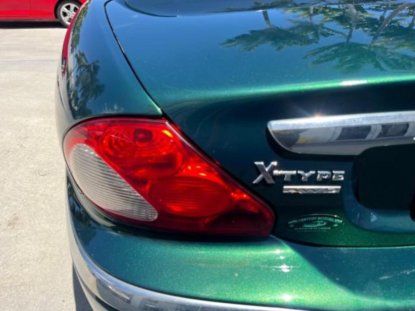 2006 Jaguar Racing Green /Ivory Jaguar X-TYPE AWD LOW MILES 61,609 (SAJWA51A56W) with an 3.0L DOHC SMPI 24-Valve V6 Engine engine, Automatic transmission, located at 4701 North Dixie Hwy, Pompano Beach, FL, 33064, (954) 422-2889, 26.240938, -80.123474 - OUR WEBPAGE FLORIDACARS1.COM HAS OVER 100 PHOTOS AND FREE CARFAX LINK 2006 JAGUAR X-TYPE 3.0L NEW $40,855 ROAD READY VIN: SAJWA51A56WE96399 NO ACCIDENTS NO RECALLS SEDAN 4 DR FLORIDA OWNER 3.0L V6 3.0L V6 F DOHC PARK SENSORS POWER LEATHER SEATS GASOLINE 7 SERVICE RECORDS POWER SUNROOF/MIRRORS ALL WH - Photo#78