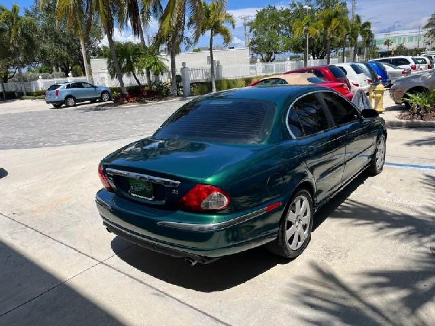 2006 Jaguar Racing Green /Ivory Jaguar X-TYPE AWD LOW MILES 61,609 (SAJWA51A56W) with an 3.0L DOHC SMPI 24-Valve V6 Engine engine, Automatic transmission, located at 4701 North Dixie Hwy, Pompano Beach, FL, 33064, (954) 422-2889, 26.240938, -80.123474 - OUR WEBPAGE FLORIDACARS1.COM HAS OVER 100 PHOTOS AND FREE CARFAX LINK 2006 JAGUAR X-TYPE 3.0L NEW $40,855 ROAD READY VIN: SAJWA51A56WE96399 NO ACCIDENTS NO RECALLS SEDAN 4 DR FLORIDA OWNER 3.0L V6 3.0L V6 F DOHC PARK SENSORS POWER LEATHER SEATS GASOLINE 7 SERVICE RECORDS POWER SUNROOF/MIRRORS ALL WH - Photo#7