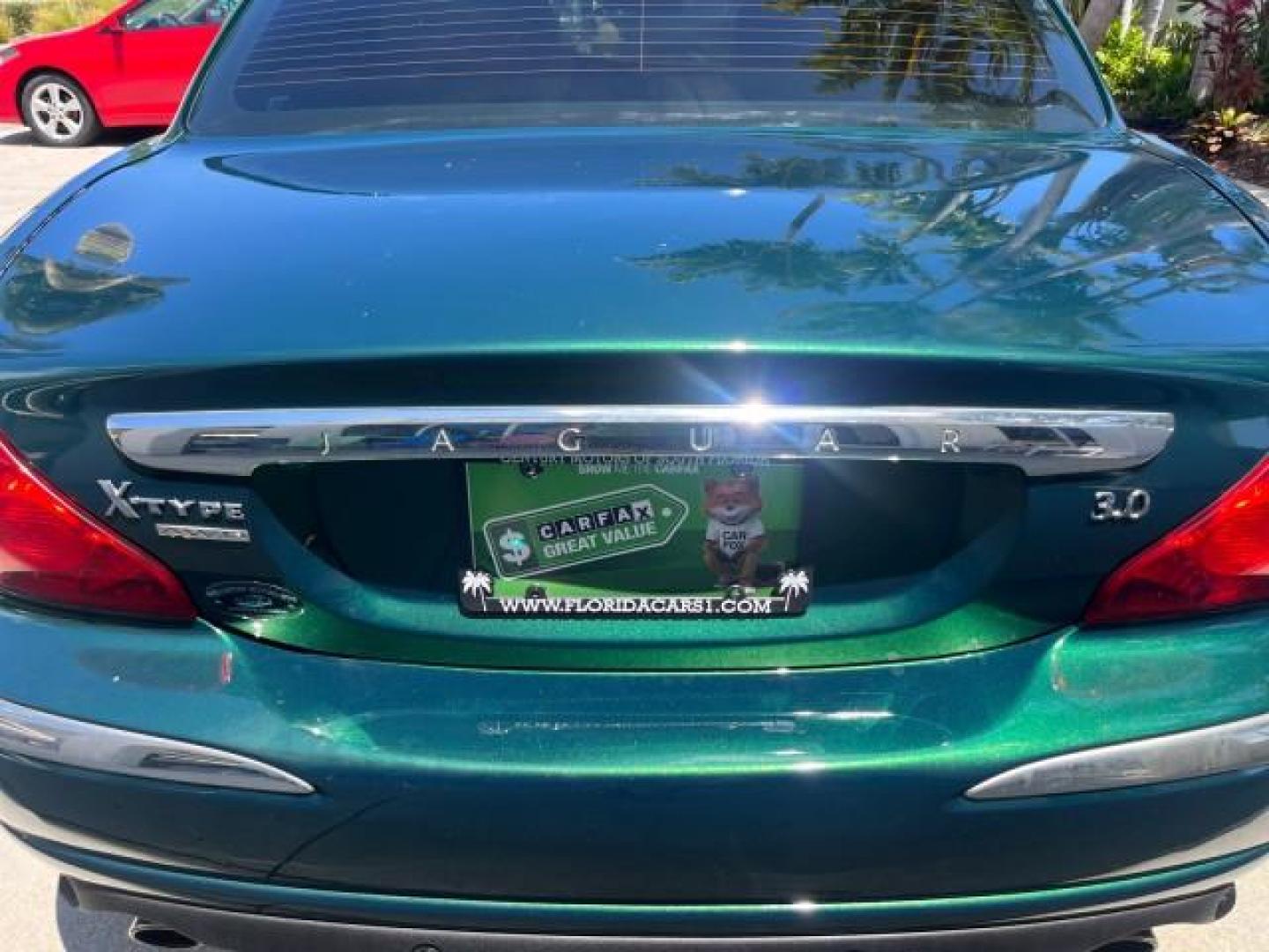 2006 Jaguar Racing Green /Ivory Jaguar X-TYPE AWD LOW MILES 61,609 (SAJWA51A56W) with an 3.0L DOHC SMPI 24-Valve V6 Engine engine, Automatic transmission, located at 4701 North Dixie Hwy, Pompano Beach, FL, 33064, (954) 422-2889, 26.240938, -80.123474 - OUR WEBPAGE FLORIDACARS1.COM HAS OVER 100 PHOTOS AND FREE CARFAX LINK 2006 JAGUAR X-TYPE 3.0L NEW $40,855 ROAD READY VIN: SAJWA51A56WE96399 NO ACCIDENTS NO RECALLS SEDAN 4 DR FLORIDA OWNER 3.0L V6 3.0L V6 F DOHC PARK SENSORS POWER LEATHER SEATS GASOLINE 7 SERVICE RECORDS POWER SUNROOF/MIRRORS ALL WH - Photo#79