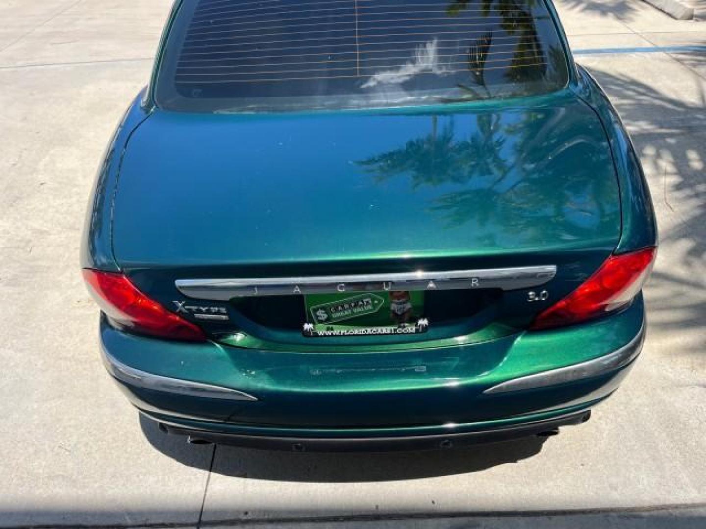 2006 Jaguar Racing Green /Ivory Jaguar X-TYPE AWD LOW MILES 61,609 (SAJWA51A56W) with an 3.0L DOHC SMPI 24-Valve V6 Engine engine, Automatic transmission, located at 4701 North Dixie Hwy, Pompano Beach, FL, 33064, (954) 422-2889, 26.240938, -80.123474 - OUR WEBPAGE FLORIDACARS1.COM HAS OVER 100 PHOTOS AND FREE CARFAX LINK 2006 JAGUAR X-TYPE 3.0L NEW $40,855 ROAD READY VIN: SAJWA51A56WE96399 NO ACCIDENTS NO RECALLS SEDAN 4 DR FLORIDA OWNER 3.0L V6 3.0L V6 F DOHC PARK SENSORS POWER LEATHER SEATS GASOLINE 7 SERVICE RECORDS POWER SUNROOF/MIRRORS ALL WH - Photo#80