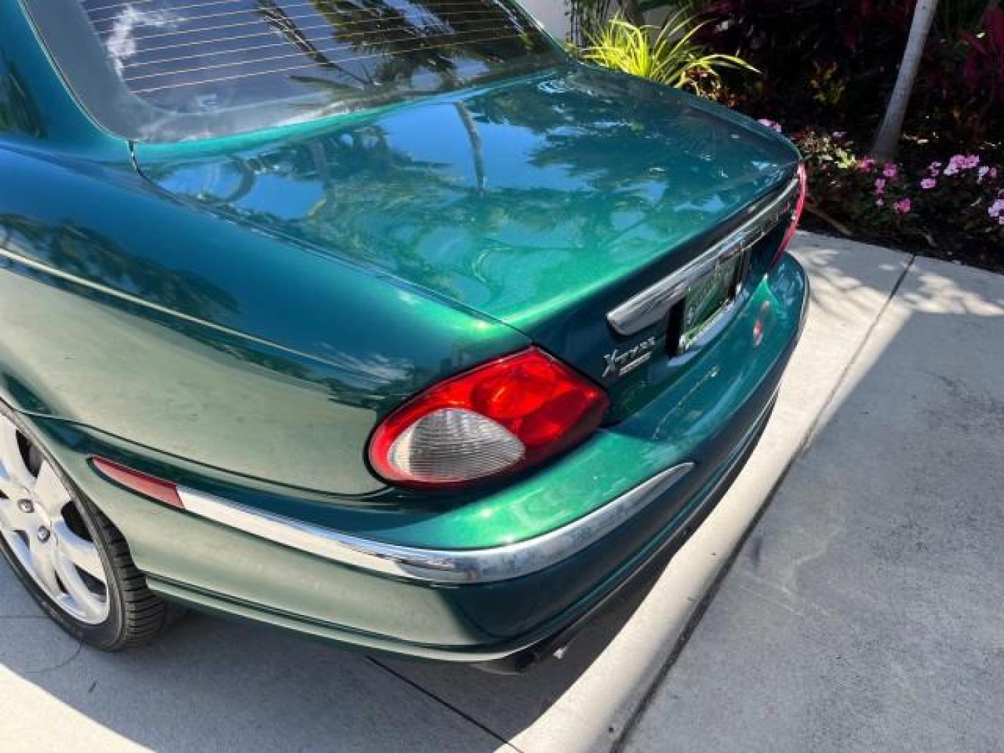 2006 Jaguar Racing Green /Ivory Jaguar X-TYPE AWD LOW MILES 61,609 (SAJWA51A56W) with an 3.0L DOHC SMPI 24-Valve V6 Engine engine, Automatic transmission, located at 4701 North Dixie Hwy, Pompano Beach, FL, 33064, (954) 422-2889, 26.240938, -80.123474 - OUR WEBPAGE FLORIDACARS1.COM HAS OVER 100 PHOTOS AND FREE CARFAX LINK 2006 JAGUAR X-TYPE 3.0L NEW $40,855 ROAD READY VIN: SAJWA51A56WE96399 NO ACCIDENTS NO RECALLS SEDAN 4 DR FLORIDA OWNER 3.0L V6 3.0L V6 F DOHC PARK SENSORS POWER LEATHER SEATS GASOLINE 7 SERVICE RECORDS POWER SUNROOF/MIRRORS ALL WH - Photo#82