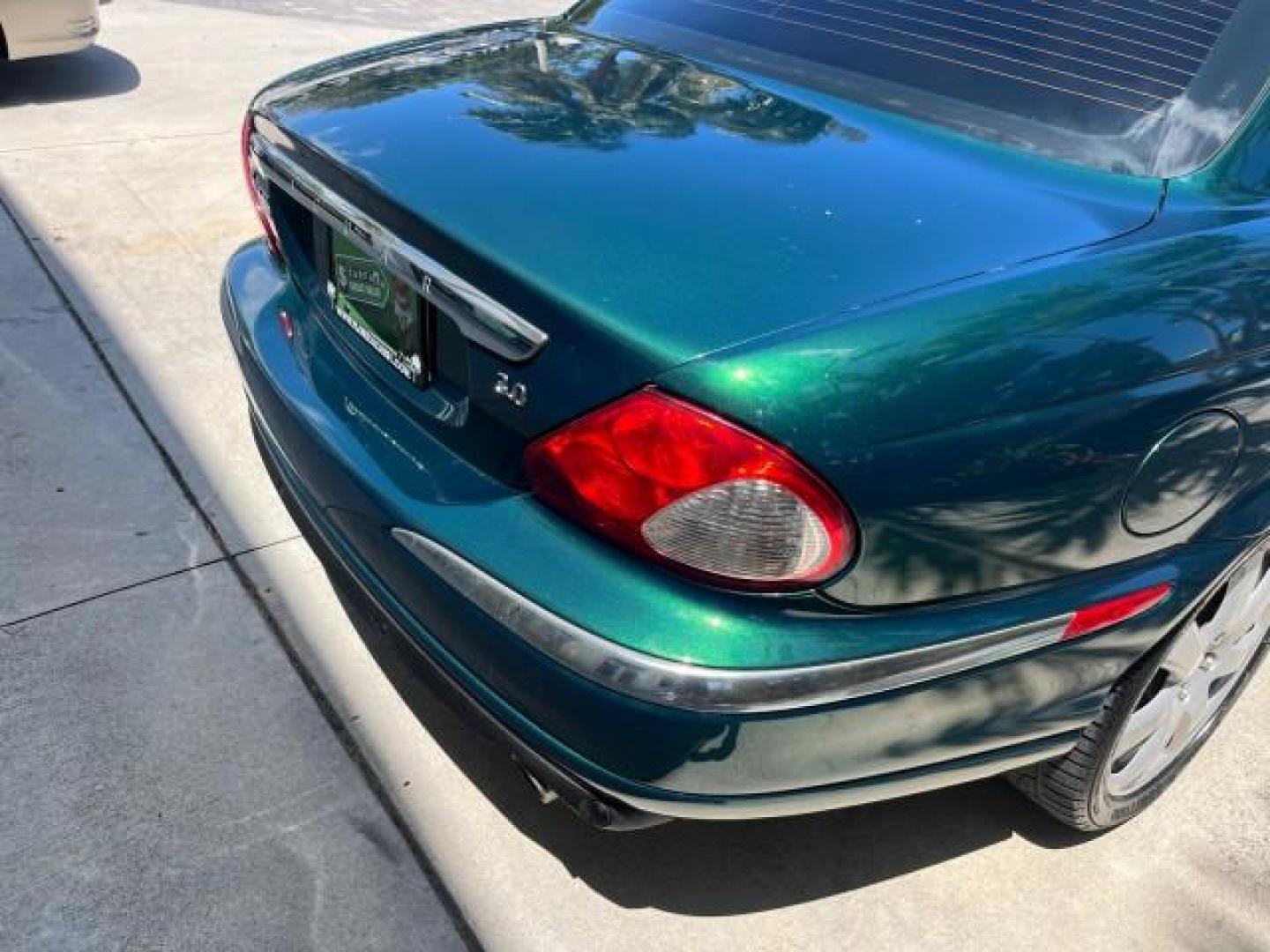 2006 Jaguar Racing Green /Ivory Jaguar X-TYPE AWD LOW MILES 61,609 (SAJWA51A56W) with an 3.0L DOHC SMPI 24-Valve V6 Engine engine, Automatic transmission, located at 4701 North Dixie Hwy, Pompano Beach, FL, 33064, (954) 422-2889, 26.240938, -80.123474 - OUR WEBPAGE FLORIDACARS1.COM HAS OVER 100 PHOTOS AND FREE CARFAX LINK 2006 JAGUAR X-TYPE 3.0L NEW $40,855 ROAD READY VIN: SAJWA51A56WE96399 NO ACCIDENTS NO RECALLS SEDAN 4 DR FLORIDA OWNER 3.0L V6 3.0L V6 F DOHC PARK SENSORS POWER LEATHER SEATS GASOLINE 7 SERVICE RECORDS POWER SUNROOF/MIRRORS ALL WH - Photo#83