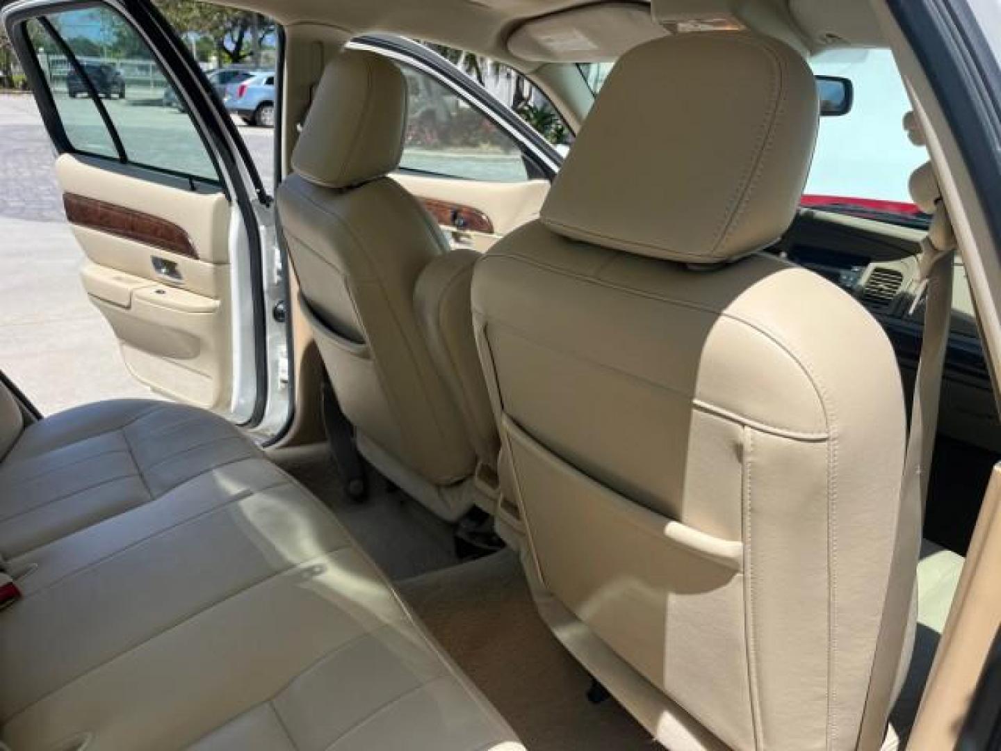 2006 Vibrant White /Light Camel Mercury Grand Marquis LS Premium LOW MILES 67,595 (2MHFM75V56X) with an 4.6L OHC FFV V8 Engine engine, Automatic transmission, located at 4701 North Dixie Hwy, Pompano Beach, FL, 33064, (954) 422-2889, 26.240938, -80.123474 - 2006 MERCURY GRAND MARQUIS LS PREMIUM ROAD READY 4.6L V8 VIN: 2MHFM75V56X641524 LOW MILES 67,595 SEDAN 4 DR NO RECALLS 4.6L V8 F POWER LEATHER SEATS FLEX FUEL POWER SUNROOF REAR WHEEL DRIVE POWER MIRRORS Adaptive Headlights Adjustable Lumbar Support Anti-Theft System Approach Lights Auto-dimming Rea - Photo#30