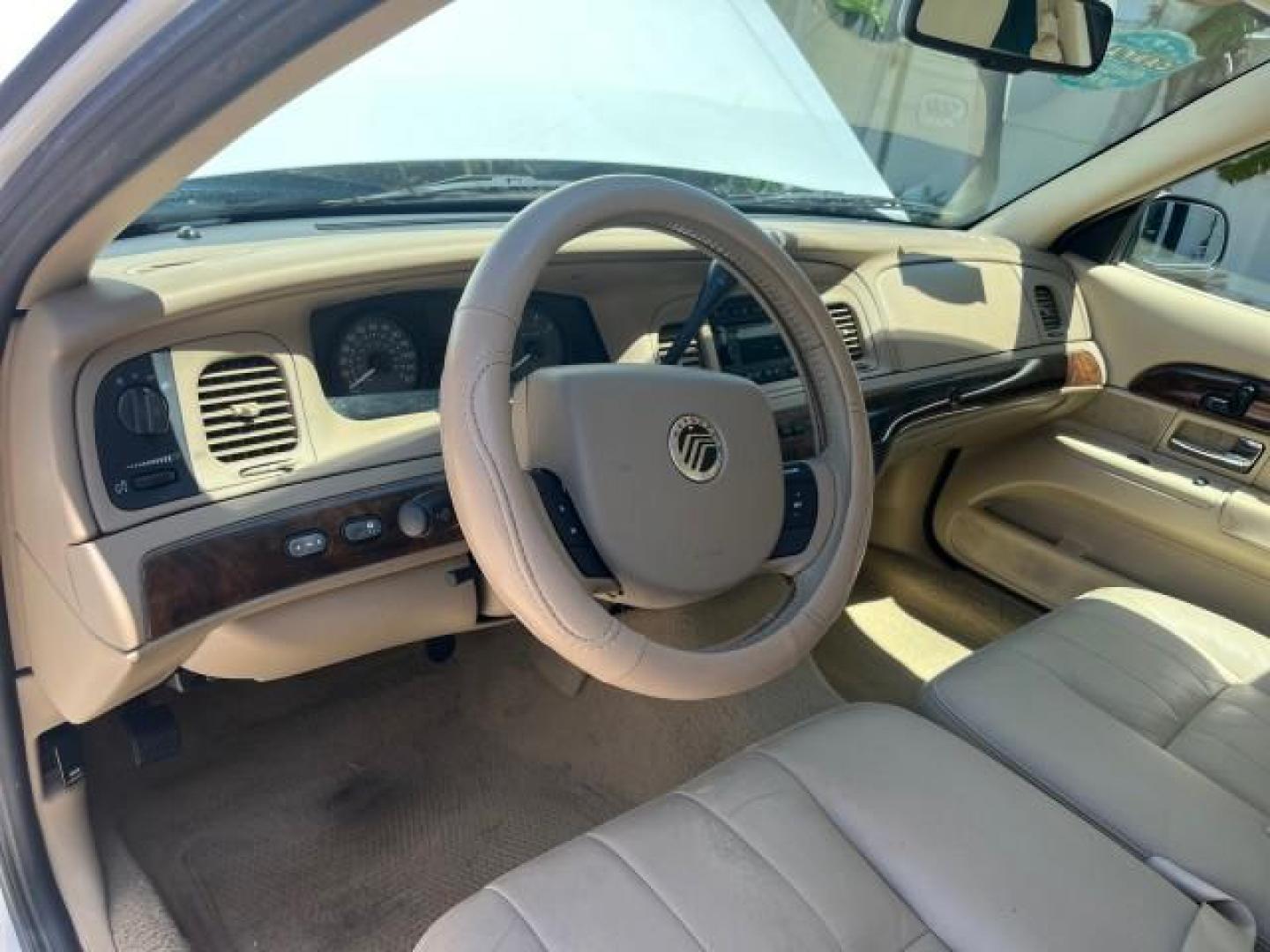 2006 Vibrant White /Light Camel Mercury Grand Marquis LS Premium LOW MILES 67,595 (2MHFM75V56X) with an 4.6L OHC FFV V8 Engine engine, Automatic transmission, located at 4701 North Dixie Hwy, Pompano Beach, FL, 33064, (954) 422-2889, 26.240938, -80.123474 - 2006 MERCURY GRAND MARQUIS LS PREMIUM ROAD READY 4.6L V8 VIN: 2MHFM75V56X641524 LOW MILES 67,595 SEDAN 4 DR NO RECALLS 4.6L V8 F POWER LEATHER SEATS FLEX FUEL POWER SUNROOF REAR WHEEL DRIVE POWER MIRRORS Adaptive Headlights Adjustable Lumbar Support Anti-Theft System Approach Lights Auto-dimming Rea - Photo#39