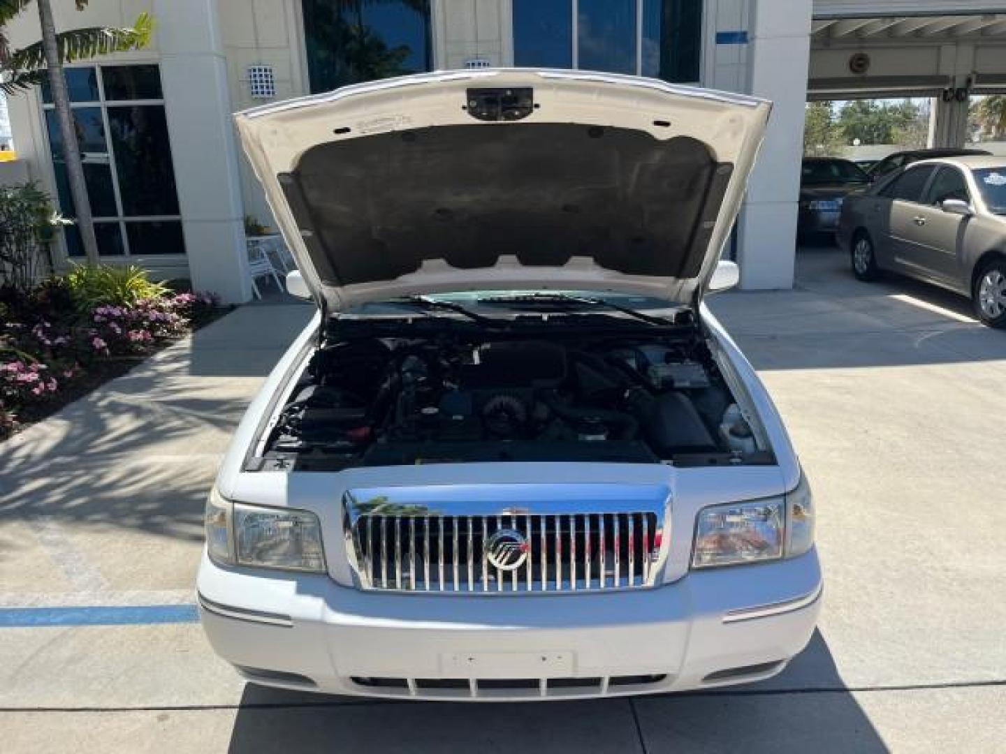 2006 Vibrant White /Light Camel Mercury Grand Marquis LS Premium LOW MILES 67,595 (2MHFM75V56X) with an 4.6L OHC FFV V8 Engine engine, Automatic transmission, located at 4701 North Dixie Hwy, Pompano Beach, FL, 33064, (954) 422-2889, 26.240938, -80.123474 - 2006 MERCURY GRAND MARQUIS LS PREMIUM ROAD READY 4.6L V8 VIN: 2MHFM75V56X641524 LOW MILES 67,595 SEDAN 4 DR NO RECALLS 4.6L V8 F POWER LEATHER SEATS FLEX FUEL POWER SUNROOF REAR WHEEL DRIVE POWER MIRRORS Adaptive Headlights Adjustable Lumbar Support Anti-Theft System Approach Lights Auto-dimming Rea - Photo#59