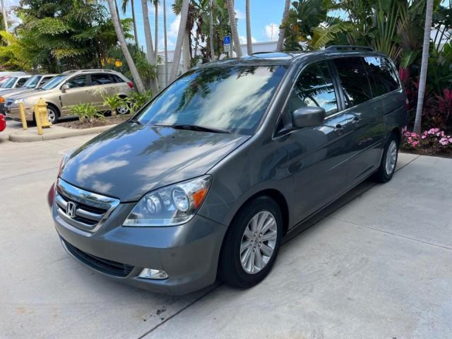 2007 Slate Green Metallic /Gray Honda Odyssey Touring LOW MILES 44,510 (5FNRL38867B) with an 3.5L SOHC MPFI 24-Valve i-VTEC V6 Engine engine, Automatic transmission, located at 4701 North Dixie Hwy, Pompano Beach, FL, 33064, (954) 422-2889, 26.240938, -80.123474 - 2007 HONDA ODYSSEY TOURING ROAD READY 3.5L V6 VIN: 5FNRL38867B062072 NO ACCIDENTS NO RECALLS VAN BACK UP CAMERA FLORIDA OWNER 3.5L V6 F SOHC 24V POWER SUNROOF POWER SLIDING DOORS GASOLINE DUAL AC POWER LEATHER SEATS FRONT WHEEL DRIVE PARK SENSORS NAVIGATION DVD Anti-Theft System Auto-dimming Rearvie - Photo#3