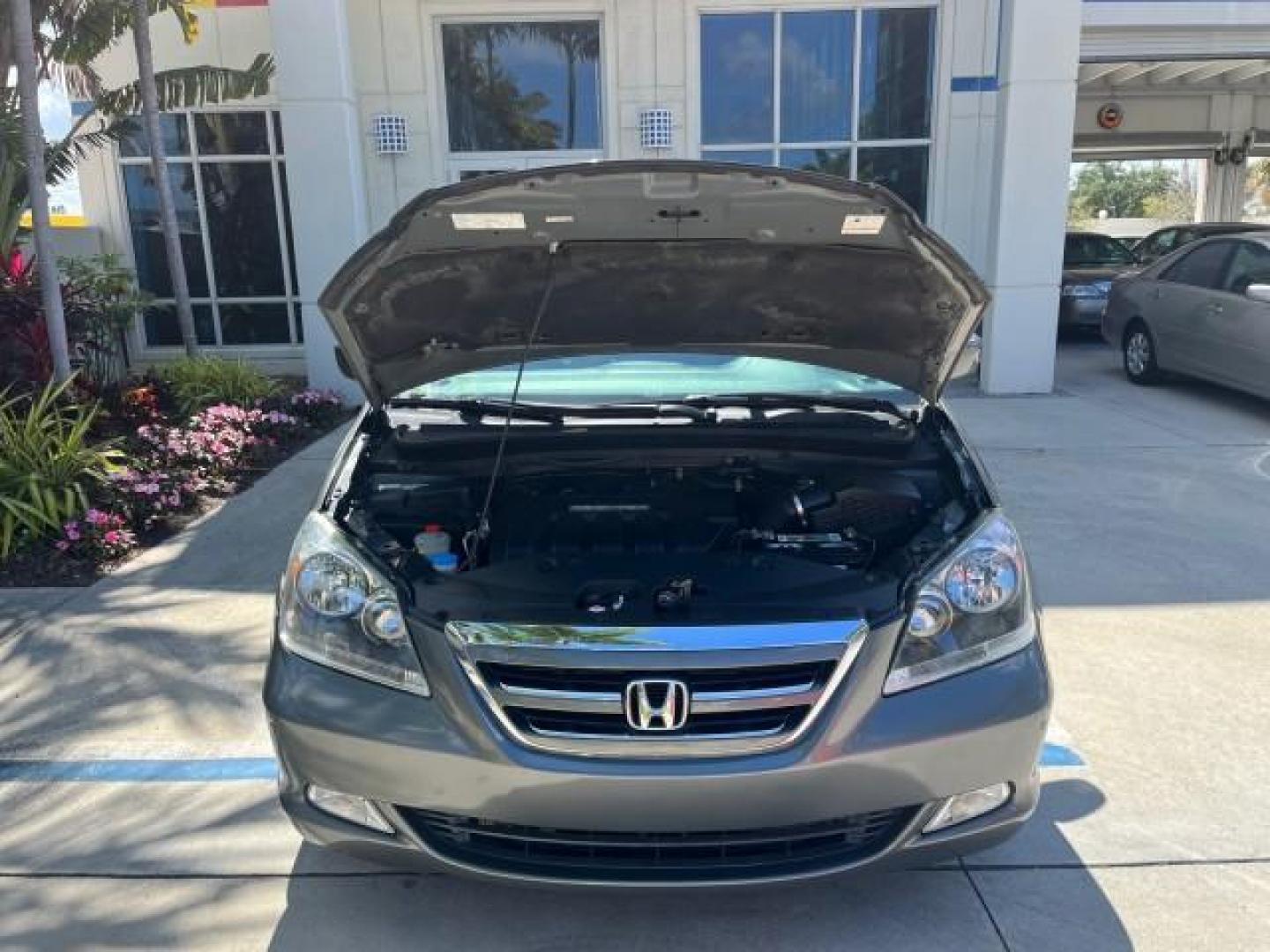 2007 Slate Green Metallic /Gray Honda Odyssey Touring LOW MILES 44,510 (5FNRL38867B) with an 3.5L SOHC MPFI 24-Valve i-VTEC V6 Engine engine, Automatic transmission, located at 4701 North Dixie Hwy, Pompano Beach, FL, 33064, (954) 422-2889, 26.240938, -80.123474 - 2007 HONDA ODYSSEY TOURING ROAD READY 3.5L V6 VIN: 5FNRL38867B062072 NO ACCIDENTS NO RECALLS VAN BACK UP CAMERA FLORIDA OWNER 3.5L V6 F SOHC 24V POWER SUNROOF POWER SLIDING DOORS GASOLINE DUAL AC POWER LEATHER SEATS FRONT WHEEL DRIVE PARK SENSORS NAVIGATION DVD Anti-Theft System Auto-dimming Rearvie - Photo#68