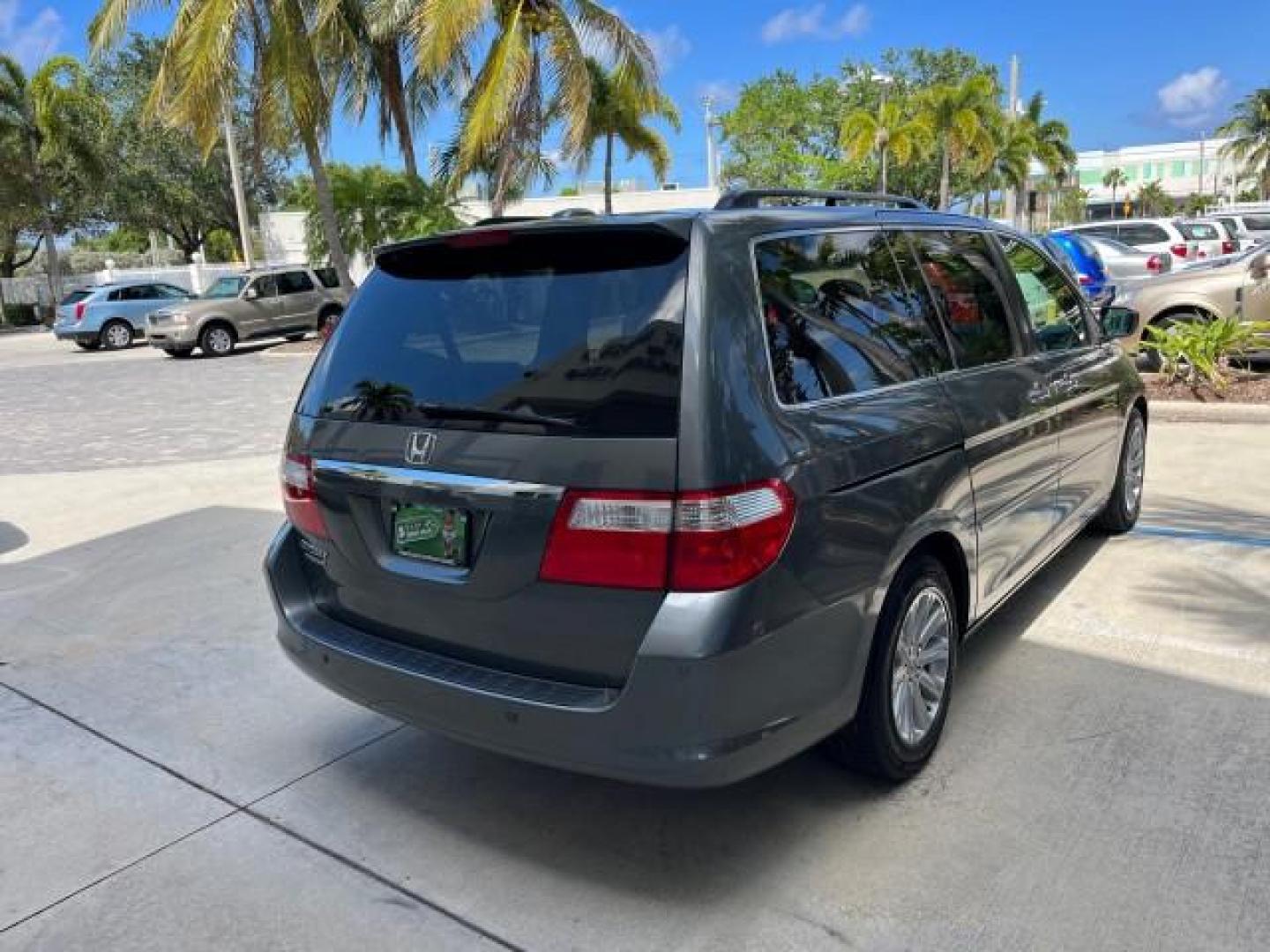 2007 Slate Green Metallic /Gray Honda Odyssey Touring LOW MILES 44,510 (5FNRL38867B) with an 3.5L SOHC MPFI 24-Valve i-VTEC V6 Engine engine, Automatic transmission, located at 4701 North Dixie Hwy, Pompano Beach, FL, 33064, (954) 422-2889, 26.240938, -80.123474 - 2007 HONDA ODYSSEY TOURING ROAD READY 3.5L V6 VIN: 5FNRL38867B062072 NO ACCIDENTS NO RECALLS VAN BACK UP CAMERA FLORIDA OWNER 3.5L V6 F SOHC 24V POWER SUNROOF POWER SLIDING DOORS GASOLINE DUAL AC POWER LEATHER SEATS FRONT WHEEL DRIVE PARK SENSORS NAVIGATION DVD Anti-Theft System Auto-dimming Rearvie - Photo#7