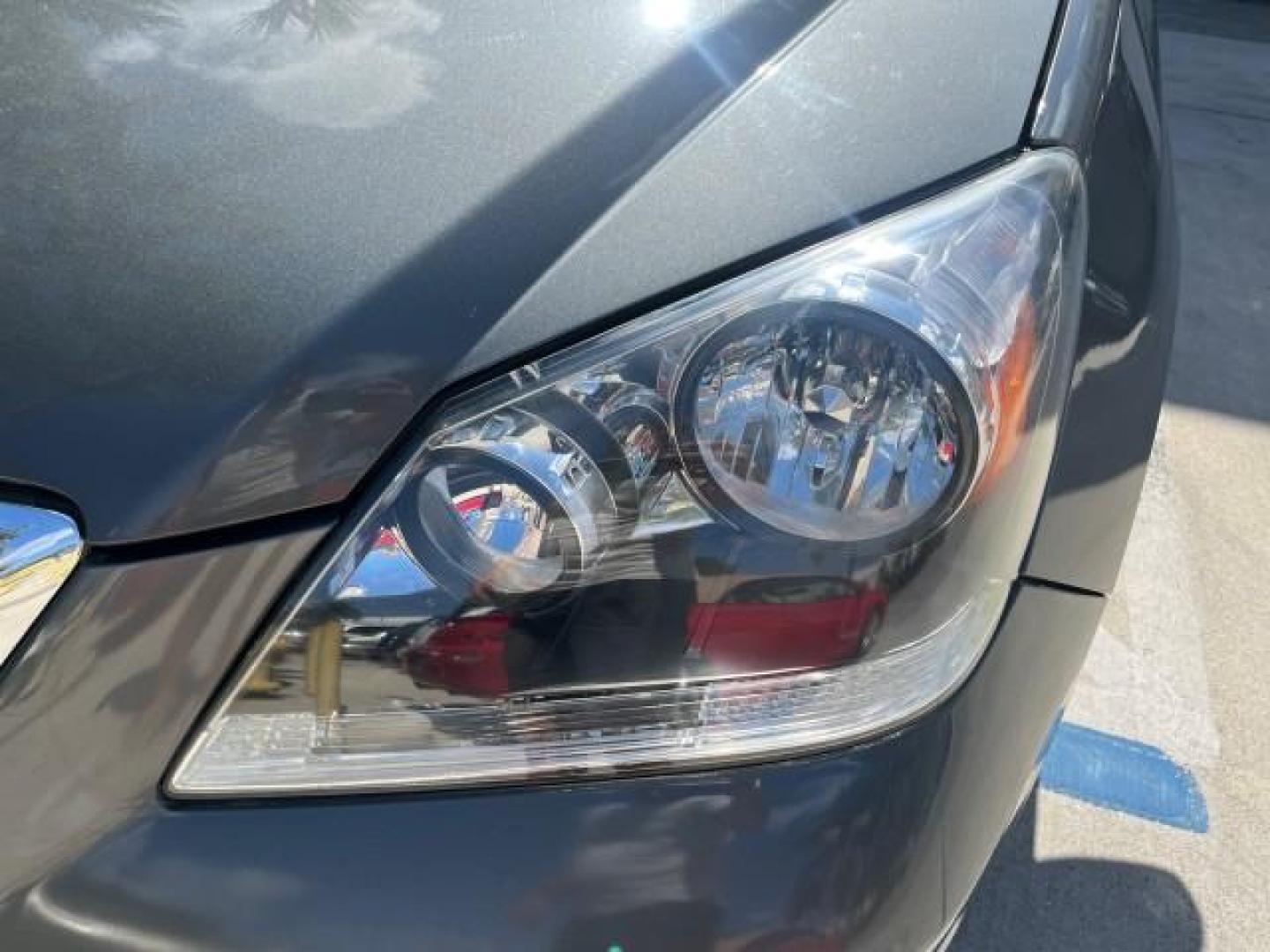 2007 Slate Green Metallic /Gray Honda Odyssey Touring LOW MILES 44,510 (5FNRL38867B) with an 3.5L SOHC MPFI 24-Valve i-VTEC V6 Engine engine, Automatic transmission, located at 4701 North Dixie Hwy, Pompano Beach, FL, 33064, (954) 422-2889, 26.240938, -80.123474 - 2007 HONDA ODYSSEY TOURING ROAD READY 3.5L V6 VIN: 5FNRL38867B062072 NO ACCIDENTS NO RECALLS VAN BACK UP CAMERA FLORIDA OWNER 3.5L V6 F SOHC 24V POWER SUNROOF POWER SLIDING DOORS GASOLINE DUAL AC POWER LEATHER SEATS FRONT WHEEL DRIVE PARK SENSORS NAVIGATION DVD Anti-Theft System Auto-dimming Rearvie - Photo#79