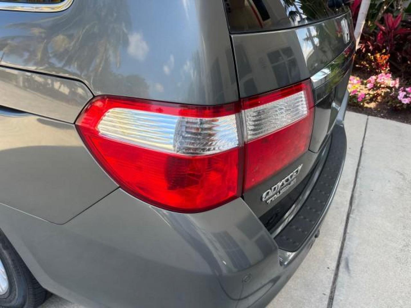 2007 Slate Green Metallic /Gray Honda Odyssey Touring LOW MILES 44,510 (5FNRL38867B) with an 3.5L SOHC MPFI 24-Valve i-VTEC V6 Engine engine, Automatic transmission, located at 4701 North Dixie Hwy, Pompano Beach, FL, 33064, (954) 422-2889, 26.240938, -80.123474 - 2007 HONDA ODYSSEY TOURING ROAD READY 3.5L V6 VIN: 5FNRL38867B062072 NO ACCIDENTS NO RECALLS VAN BACK UP CAMERA FLORIDA OWNER 3.5L V6 F SOHC 24V POWER SUNROOF POWER SLIDING DOORS GASOLINE DUAL AC POWER LEATHER SEATS FRONT WHEEL DRIVE PARK SENSORS NAVIGATION DVD Anti-Theft System Auto-dimming Rearvie - Photo#96