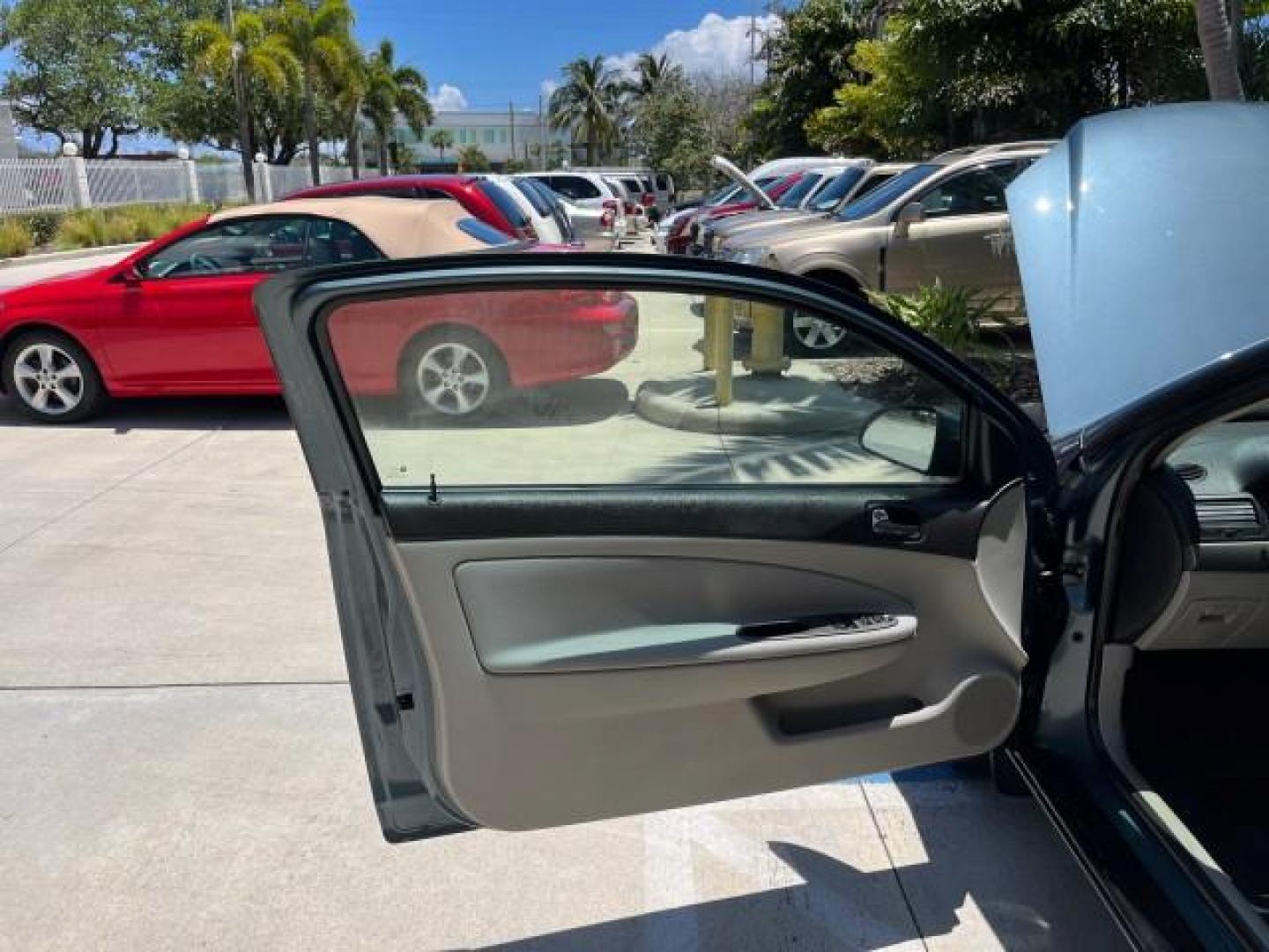 2007 Blue Granite Metallic /Gray Chevrolet Cobalt 1 FL LT LOW MILES 37,042 (1G1AL15F977) with an Ecotec 2.2L DOHC 16-Valve 4-Cyl SFI Engine engine, Automatic transmission, located at 4701 North Dixie Hwy, Pompano Beach, FL, 33064, (954) 422-2889, 26.240938, -80.123474 - OUR WEBPAGE FLORIDACARS1.COM HAS OVER 100 PHOTOS AND FREE CARFAX LINK 2007 CHEVROLET COBALT LT ROAD READY 2.2L 4 CYL VIN: 1G1AL15F977415522 NO ACCIDENTS NO RECALLS COUPE 17 SERVICE RECORDS 2.2L I4 F DOHC 1 OWNER FLORIDA GASOLINE LOW MILES 37,042 FRONT WHEEL DRIVE 34 MPG Anti-Theft System FWD Front B - Photo#9