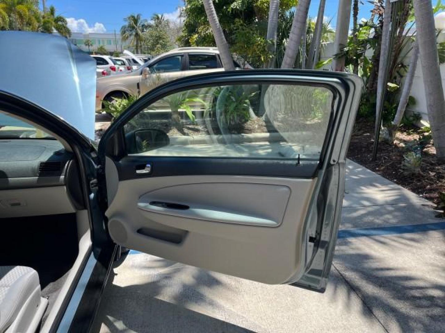 2007 Blue Granite Metallic /Gray Chevrolet Cobalt 1 FL LT LOW MILES 37,042 (1G1AL15F977) with an Ecotec 2.2L DOHC 16-Valve 4-Cyl SFI Engine engine, Automatic transmission, located at 4701 North Dixie Hwy, Pompano Beach, FL, 33064, (954) 422-2889, 26.240938, -80.123474 - OUR WEBPAGE FLORIDACARS1.COM HAS OVER 100 PHOTOS AND FREE CARFAX LINK 2007 CHEVROLET COBALT LT ROAD READY 2.2L 4 CYL VIN: 1G1AL15F977415522 NO ACCIDENTS NO RECALLS COUPE 17 SERVICE RECORDS 2.2L I4 F DOHC 1 OWNER FLORIDA GASOLINE LOW MILES 37,042 FRONT WHEEL DRIVE 34 MPG Anti-Theft System FWD Front B - Photo#11