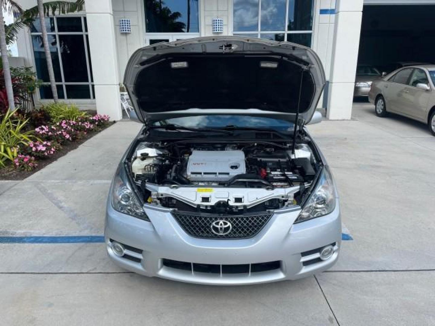 2008 Classic Silver Metallic /Dark Gray Toyota Camry Solara 1 FL SLE LOW MILES 49,029 (4T1FA38P38U) with an 3.3L DOHC SMPI VVT-i 24-Valve V6 Engine engine, Automatic transmission, located at 4701 North Dixie Hwy, Pompano Beach, FL, 33064, (954) 422-2889, 26.240938, -80.123474 - OUR WEBPAGE FLORIDACARS1.COM HAS OVER 100 PHOTOS AND FREE CARFAX LINK 2008 TOYOTA CAMRY SOLARA SLE V6 ROAD READY 3.3L V6 VIN: 4T1FA38P38U158052 NO RECALLS 29 MPG CONVERTIBLE 1 OWNER FLORIDA 3.3L V6 F DOHC 24V SLE POWER CONVERTIBLE TOP GASOLINE BLUETOOTH POWER LEATHER SEATS FRONT WHEEL DRIVE 18 SERVI - Photo#57