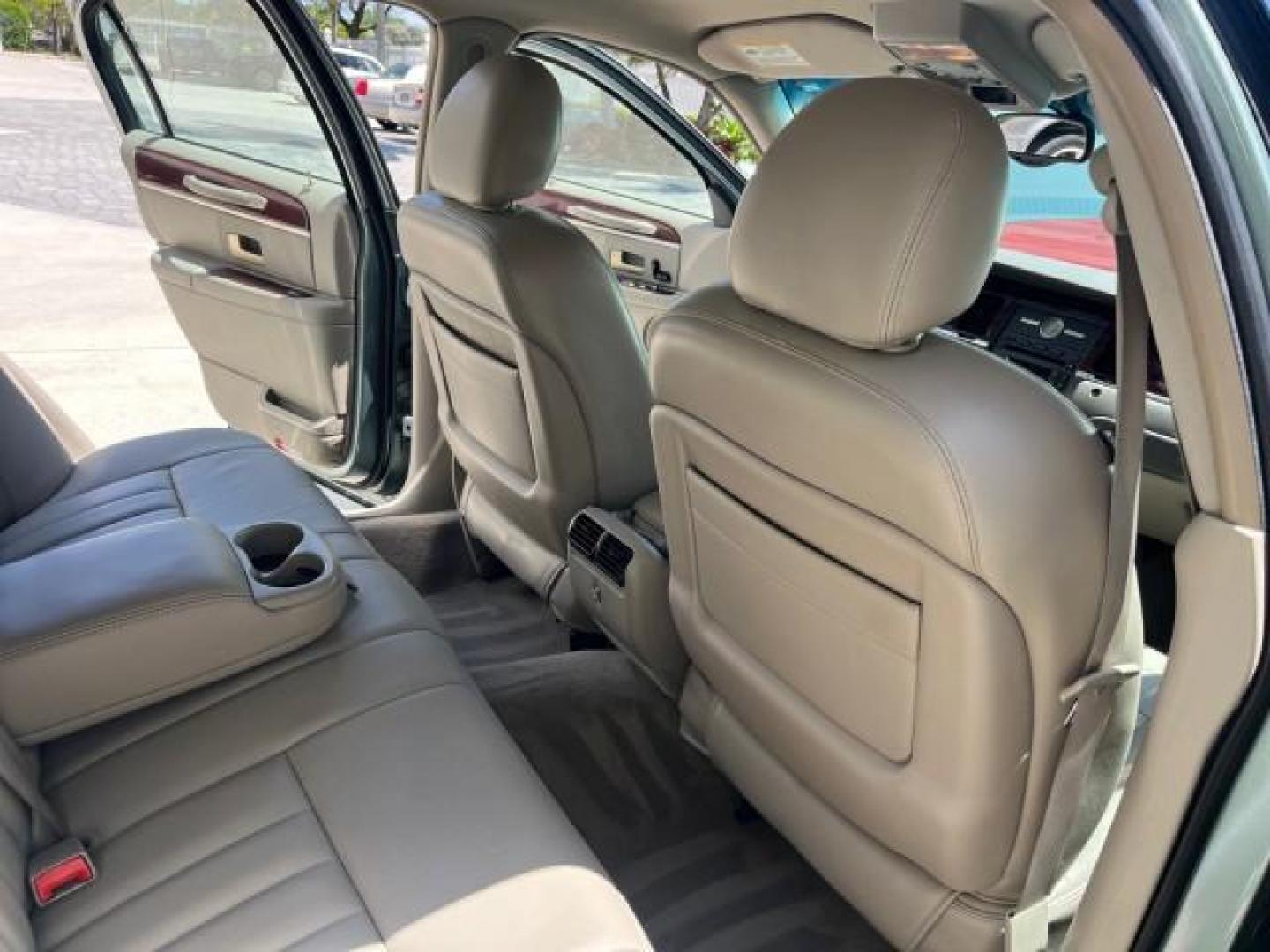 2005 Light Tundra Metallic /Shale/Dove Lincoln Town Car Signature LOW MILES 61,191 (1LNHM81W05Y) with an 4.6L SOHC SMPI V8 Engine engine, Automatic transmission, located at 4701 North Dixie Hwy, Pompano Beach, FL, 33064, (954) 422-2889, 26.240938, -80.123474 - 2005 LINCOLN TOWN CAR SIGNATURE NEW $42,055 ROAD READY VIN: 1LNHM81W05Y642621 NO ACCIDENTS NO RECALLS SEDAN 4 DR FLORIDA OWNER 4.6L V8 4.6L V8 F OHV 16V SIGNATURE LOW MILES 61,191 GASOLINE DUAL ZONE AC 14 SERVICE RECORDS REAR WHEEL DRIVE PARK SENSORS POWER LEATHER SEATS Alloy Wheels Anti-Theft Syste - Photo#30