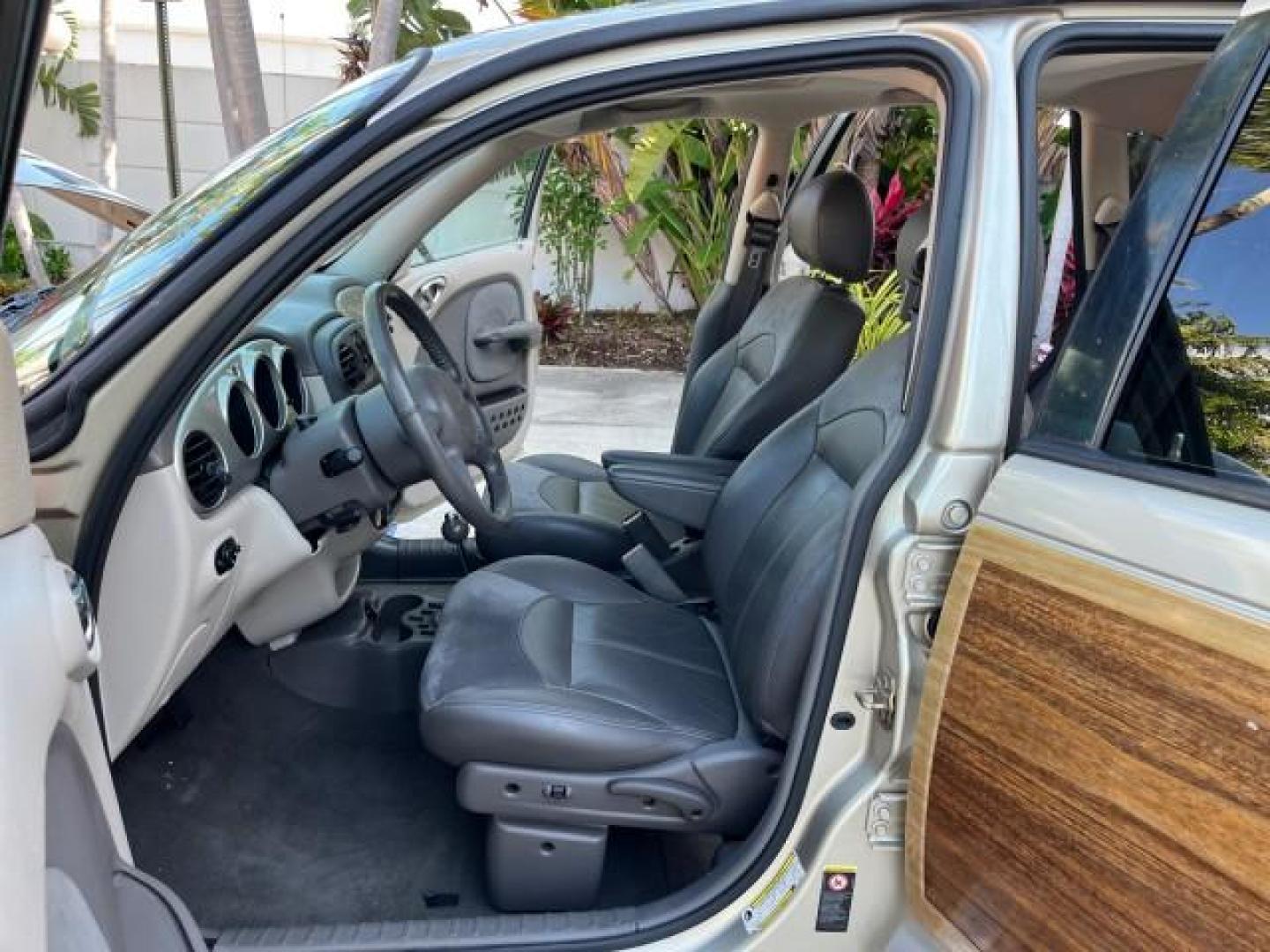 2005 Linen Gold Metallic Pearl /Taupe/Pearl Beige Chrysler PT Cruiser Limited LOW MILES 27,053 (3C8FY68885T) with an 2.4L DOHC 16-Valve Turbo I4 Engine engine, Automatic transmission, located at 4701 North Dixie Hwy, Pompano Beach, FL, 33064, (954) 422-2889, 26.240938, -80.123474 - 2005 CHRYSLER PT CRUISER LIMITED ROAD READY 2.4L I4 VIN: 3C8FY68885T540043 NO ACCIDENTS VAN NO RECALLS 2.4L I4 F DOHC 16V TURBO FLORIDA OWNER GASOLINE POWER SUNROOF LOW MILES 27,053 FRONT WHEEL DRIVE 16 SERVICE RECORDS POWER LEATHER SEATS Alloy Wheels Anti-Theft System Automatic Climate Control Crui - Photo#10