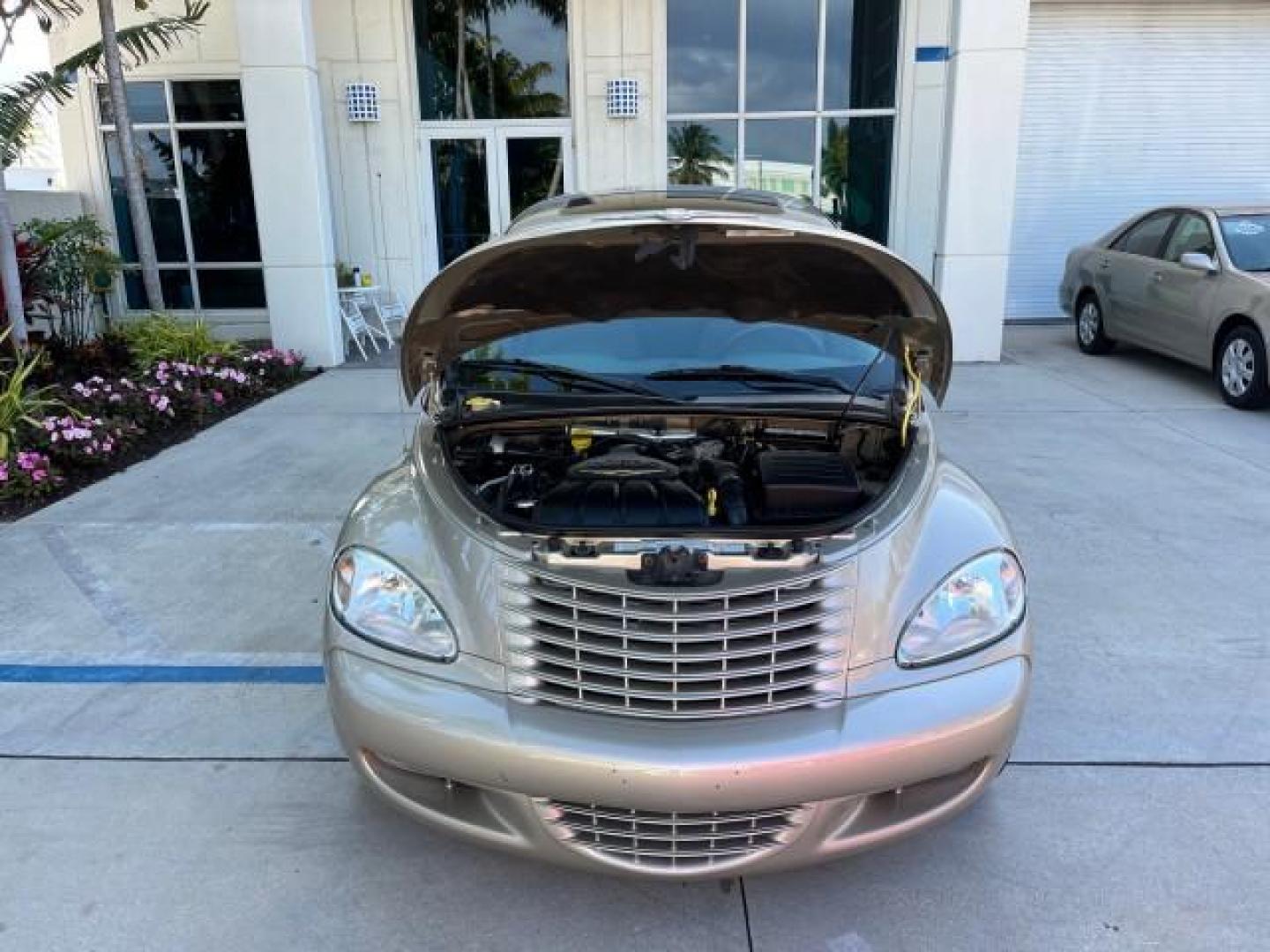 2005 Linen Gold Metallic Pearl /Taupe/Pearl Beige Chrysler PT Cruiser Limited LOW MILES 27,053 (3C8FY68885T) with an 2.4L DOHC 16-Valve Turbo I4 Engine engine, Automatic transmission, located at 4701 North Dixie Hwy, Pompano Beach, FL, 33064, (954) 422-2889, 26.240938, -80.123474 - 2005 CHRYSLER PT CRUISER LIMITED ROAD READY 2.4L I4 VIN: 3C8FY68885T540043 NO ACCIDENTS VAN NO RECALLS 2.4L I4 F DOHC 16V TURBO FLORIDA OWNER GASOLINE POWER SUNROOF LOW MILES 27,053 FRONT WHEEL DRIVE 16 SERVICE RECORDS POWER LEATHER SEATS Alloy Wheels Anti-Theft System Automatic Climate Control Crui - Photo#66