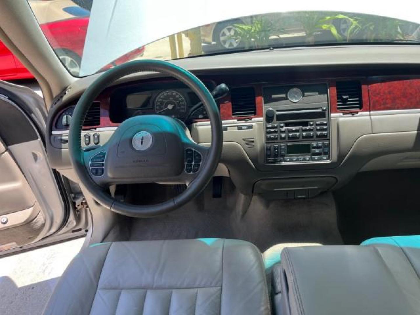 2004 Silver Birch Metallic /Med/Lt Parchment Lincoln Town Car 1 FL Signature LOW MILES 73,974 (1LNHM81W04Y) with an 4.6L SOHC SMPI V8 Engine engine, Automatic transmission, located at 4701 North Dixie Hwy, Pompano Beach, FL, 33064, (954) 422-2889, 26.240938, -80.123474 - OUR WEBPAGE FLORIDACARS1.COM HAS OVER 100 PHOTOS AND FREE CARFAX LINK 2004 LINCOLN TOWN CAR EXECUTIVE NEW $ 41,675 ROAD READY VIN: 1LNHM81W04Y644397 NO RECALLS 4.6L V8 SEDAN 4 DR 1 OWNER FLORIDA 4.6L V8 F OHV 16V 44 SERVICE RECORDS GASOLINE POWER SEATS/MIRRORS LOW MILES 73,974 REAR WHEEL DRIVE PARK - Photo#35