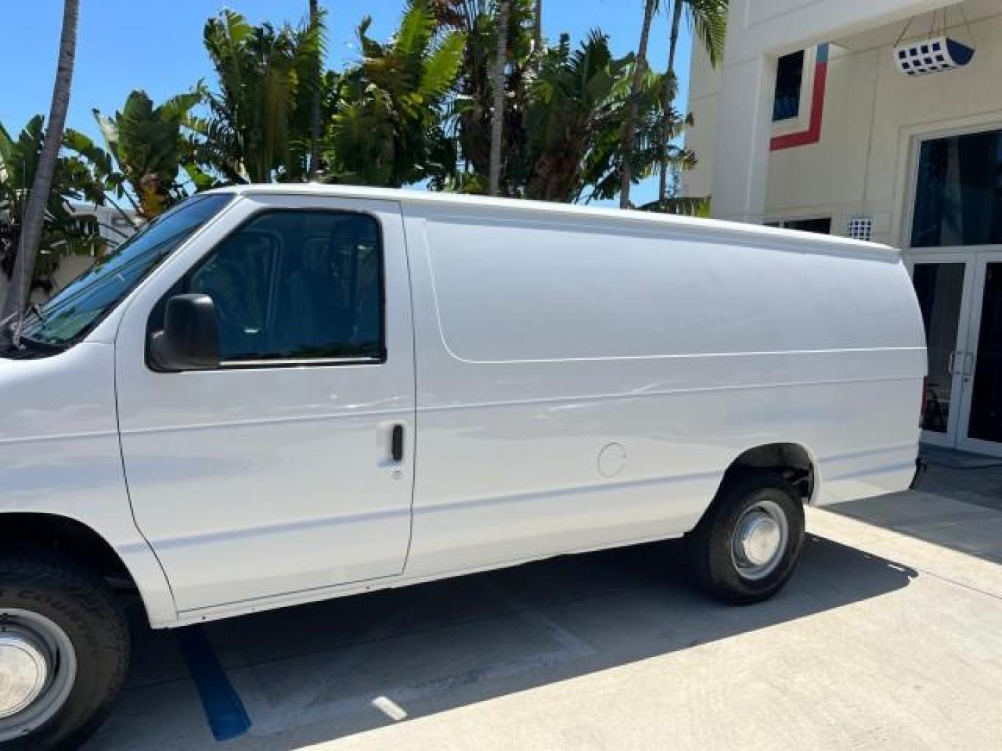 2003 Oxford White /Medium Flint Ford Econoline Cargo Van EXT Super LOW MILES 68,688 (1FTNS24223H) with an 4.2L EFI V6 Engine engine, Automatic transmission, located at 4701 North Dixie Hwy, Pompano Beach, FL, 33064, (954) 422-2889, 26.240938, -80.123474 - OUR WEBPAGE FLORIDACARS1.COM HAS OVER 100 PHOTOS AND FREE CARFAX LINK 2003 FORD E-SERIES E-250 ROAD READY WORK READY VIN: 1FTNS24223HB96651 NO RECALLS 4.2L V6 VAN LOW MILES 68,684 4.2L V6 F SOHC 10 SERVICE RECORDS GASOLINE REAR WHEEL DRIVE Front Bucket Seats RWD THIS IS ONE OF THE NICEST FORD VANS W - Photo#68