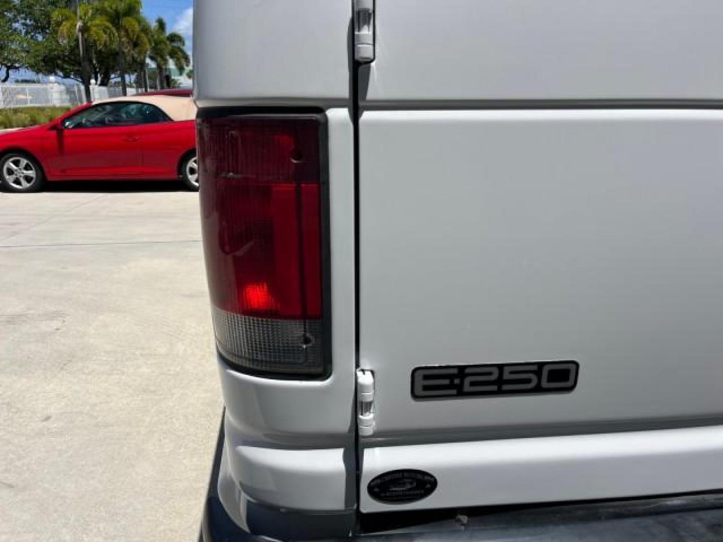 2003 Oxford White /Medium Flint Ford Econoline Cargo Van EXT Super LOW MILES 68,688 (1FTNS24223H) with an 4.2L EFI V6 Engine engine, Automatic transmission, located at 4701 North Dixie Hwy, Pompano Beach, FL, 33064, (954) 422-2889, 26.240938, -80.123474 - OUR WEBPAGE FLORIDACARS1.COM HAS OVER 100 PHOTOS AND FREE CARFAX LINK 2003 FORD E-SERIES E-250 ROAD READY WORK READY VIN: 1FTNS24223HB96651 NO RECALLS 4.2L V6 VAN LOW MILES 68,684 4.2L V6 F SOHC 10 SERVICE RECORDS GASOLINE REAR WHEEL DRIVE Front Bucket Seats RWD THIS IS ONE OF THE NICEST FORD VANS W - Photo#82