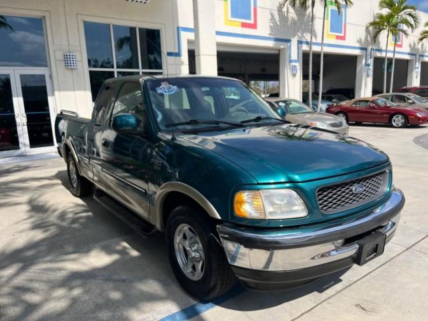 1998 Pacific Green (CC/Met) /Medium Prarie Tan Ford F-150 1 FL Lariat LOW MILES 78,833 (1FTZX1763WN) with an 4.6L EFI OHC V8 Triton Engine engine, Automatic transmission, located at 4701 North Dixie Hwy, Pompano Beach, FL, 33064, (954) 422-2889, 26.240938, -80.123474 - 1998 FORD F-150 ROAD READY 4.6L V8 VIN: 1FTZX1763WNB09132 1 OWNER FLORIDA 3 DOOR EXTENDED CAB PICKUP NO RECALLS 4.6L V8 F LOW MILES 78,833 GASOLINE 6.6 FT BED POWER LEATHER SEATS REAR WHEEL DRIVE POWER MIRRORS 8 SERVICE RECORDS THIS IS ONE OF THE NICEST FORD F-150 WE HAVE EVER LISTED RETIREE FLORIDA - Photo#51