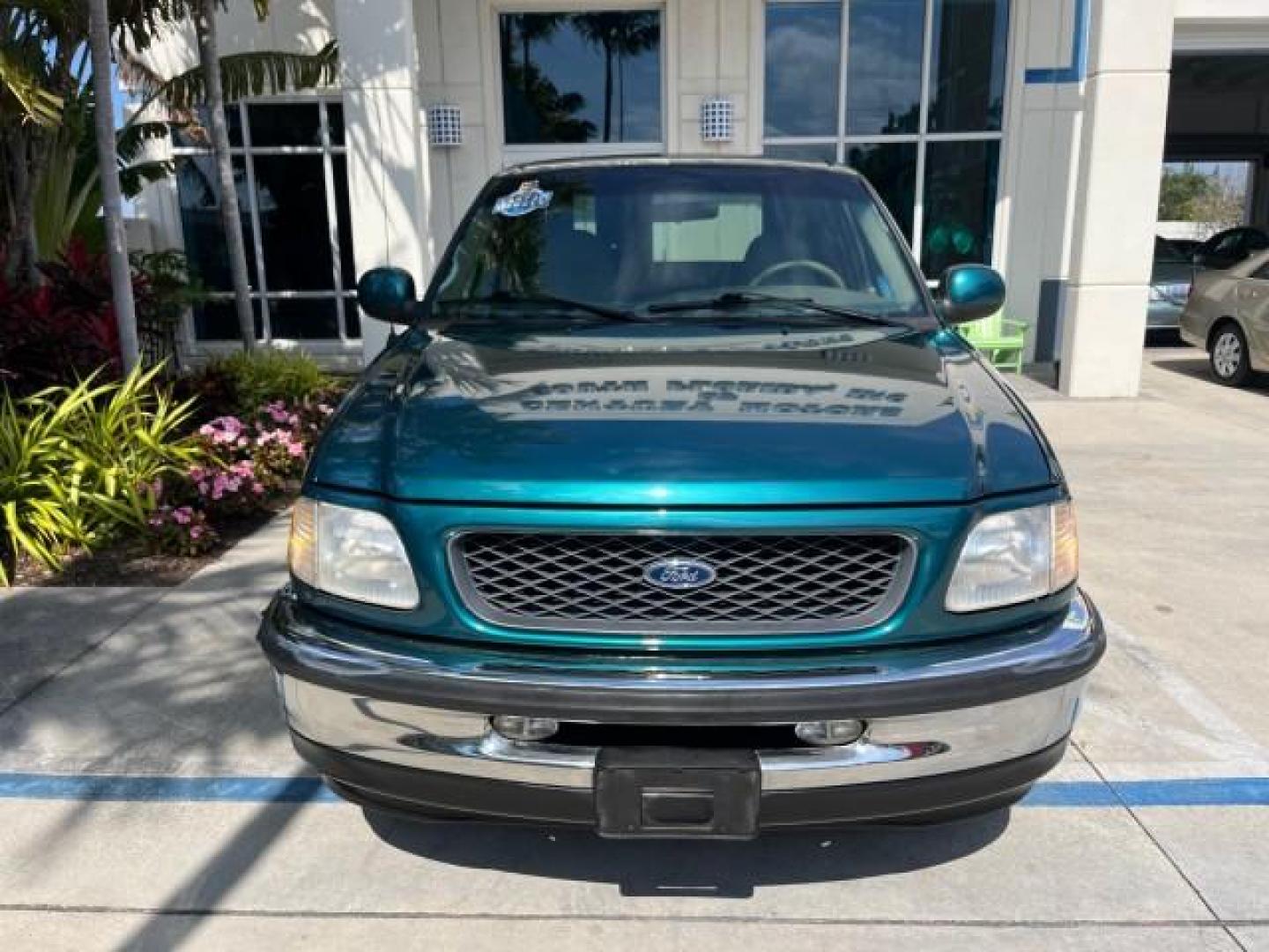 1998 Pacific Green (CC/Met) /Medium Prarie Tan Ford F-150 1 FL Lariat LOW MILES 78,833 (1FTZX1763WN) with an 4.6L EFI OHC V8 Triton Engine engine, Automatic transmission, located at 4701 North Dixie Hwy, Pompano Beach, FL, 33064, (954) 422-2889, 26.240938, -80.123474 - 1998 FORD F-150 ROAD READY 4.6L V8 VIN: 1FTZX1763WNB09132 1 OWNER FLORIDA 3 DOOR EXTENDED CAB PICKUP NO RECALLS 4.6L V8 F LOW MILES 78,833 GASOLINE 6.6 FT BED POWER LEATHER SEATS REAR WHEEL DRIVE POWER MIRRORS 8 SERVICE RECORDS THIS IS ONE OF THE NICEST FORD F-150 WE HAVE EVER LISTED RETIREE FLORIDA - Photo#56