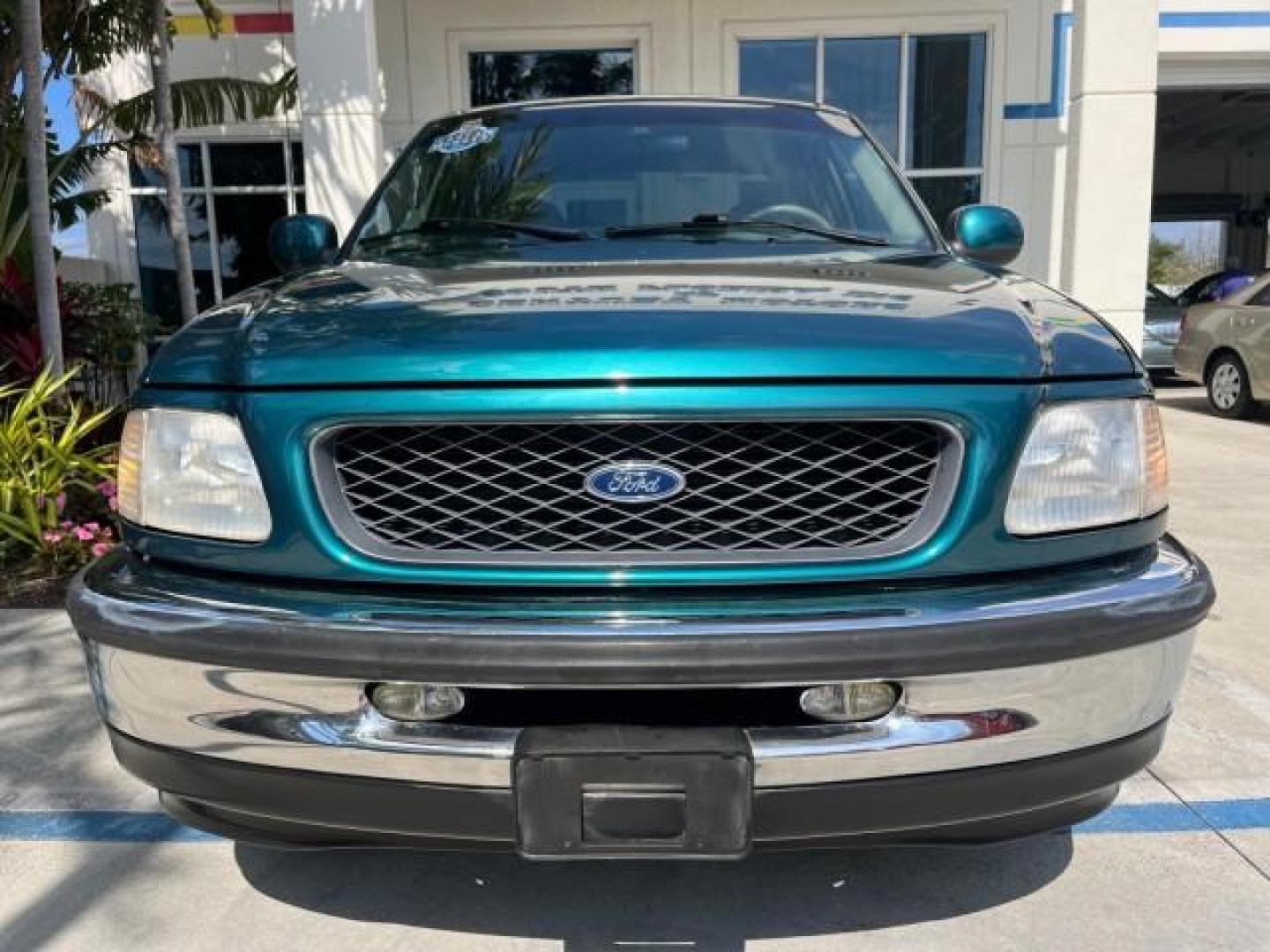 1998 Pacific Green (CC/Met) /Medium Prarie Tan Ford F-150 1 FL Lariat LOW MILES 78,833 (1FTZX1763WN) with an 4.6L EFI OHC V8 Triton Engine engine, Automatic transmission, located at 4701 North Dixie Hwy, Pompano Beach, FL, 33064, (954) 422-2889, 26.240938, -80.123474 - 1998 FORD F-150 ROAD READY 4.6L V8 VIN: 1FTZX1763WNB09132 1 OWNER FLORIDA 3 DOOR EXTENDED CAB PICKUP NO RECALLS 4.6L V8 F LOW MILES 78,833 GASOLINE 6.6 FT BED POWER LEATHER SEATS REAR WHEEL DRIVE POWER MIRRORS 8 SERVICE RECORDS THIS IS ONE OF THE NICEST FORD F-150 WE HAVE EVER LISTED RETIREE FLORIDA - Photo#61