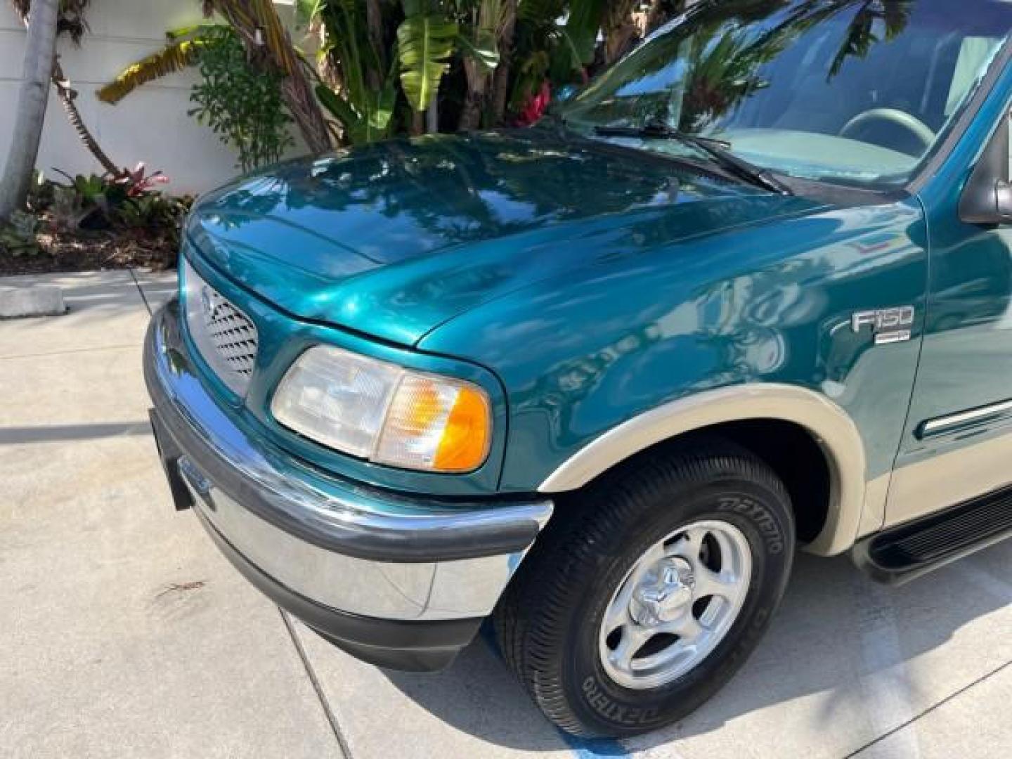 1998 Pacific Green (CC/Met) /Medium Prarie Tan Ford F-150 1 FL Lariat LOW MILES 78,833 (1FTZX1763WN) with an 4.6L EFI OHC V8 Triton Engine engine, Automatic transmission, located at 4701 North Dixie Hwy, Pompano Beach, FL, 33064, (954) 422-2889, 26.240938, -80.123474 - 1998 FORD F-150 ROAD READY 4.6L V8 VIN: 1FTZX1763WNB09132 1 OWNER FLORIDA 3 DOOR EXTENDED CAB PICKUP NO RECALLS 4.6L V8 F LOW MILES 78,833 GASOLINE 6.6 FT BED POWER LEATHER SEATS REAR WHEEL DRIVE POWER MIRRORS 8 SERVICE RECORDS THIS IS ONE OF THE NICEST FORD F-150 WE HAVE EVER LISTED RETIREE FLORIDA - Photo#64