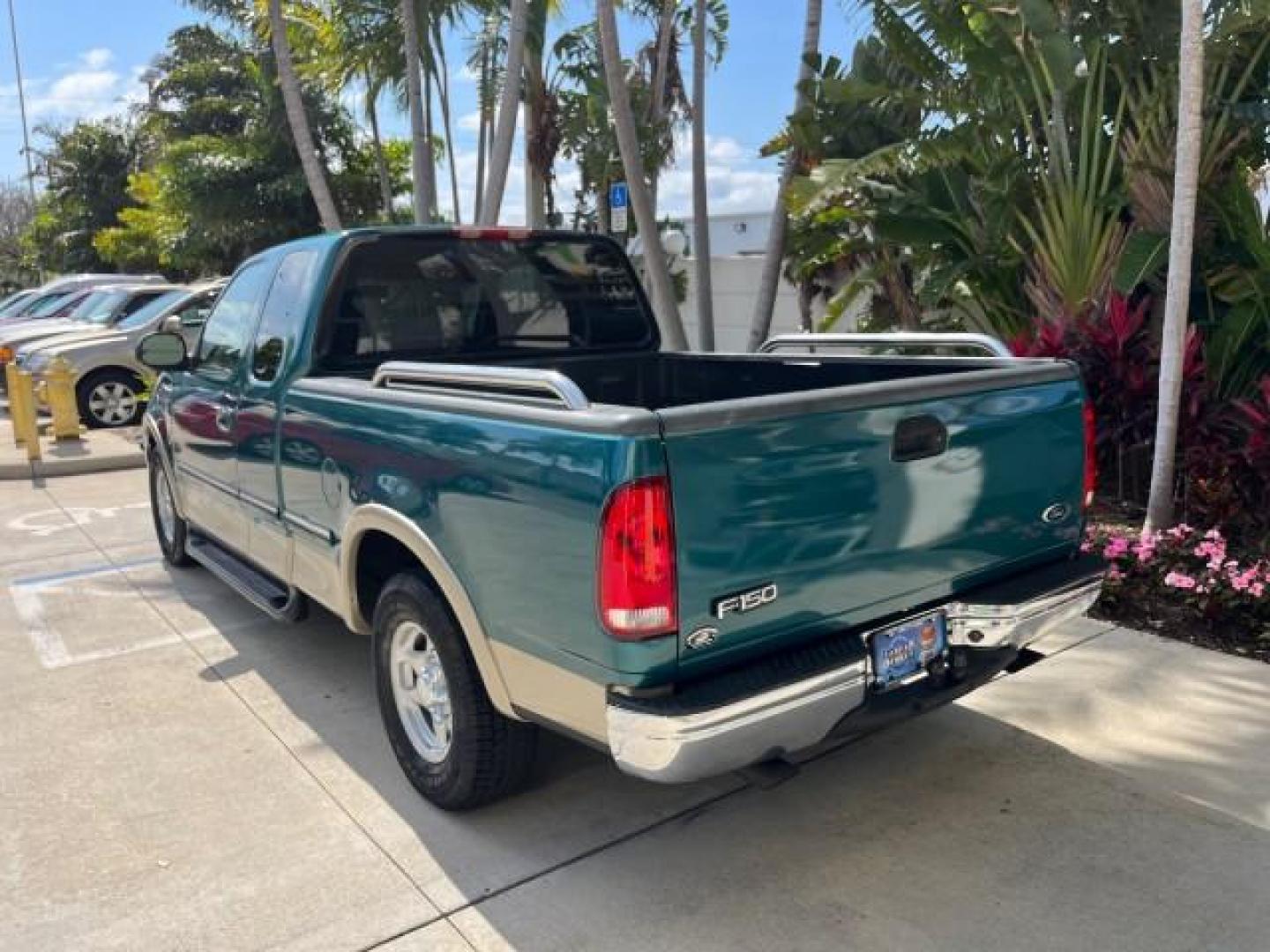 1998 Pacific Green (CC/Met) /Medium Prarie Tan Ford F-150 1 FL Lariat LOW MILES 78,833 (1FTZX1763WN) with an 4.6L EFI OHC V8 Triton Engine engine, Automatic transmission, located at 4701 North Dixie Hwy, Pompano Beach, FL, 33064, (954) 422-2889, 26.240938, -80.123474 - 1998 FORD F-150 ROAD READY 4.6L V8 VIN: 1FTZX1763WNB09132 1 OWNER FLORIDA 3 DOOR EXTENDED CAB PICKUP NO RECALLS 4.6L V8 F LOW MILES 78,833 GASOLINE 6.6 FT BED POWER LEATHER SEATS REAR WHEEL DRIVE POWER MIRRORS 8 SERVICE RECORDS THIS IS ONE OF THE NICEST FORD F-150 WE HAVE EVER LISTED RETIREE FLORIDA - Photo#77