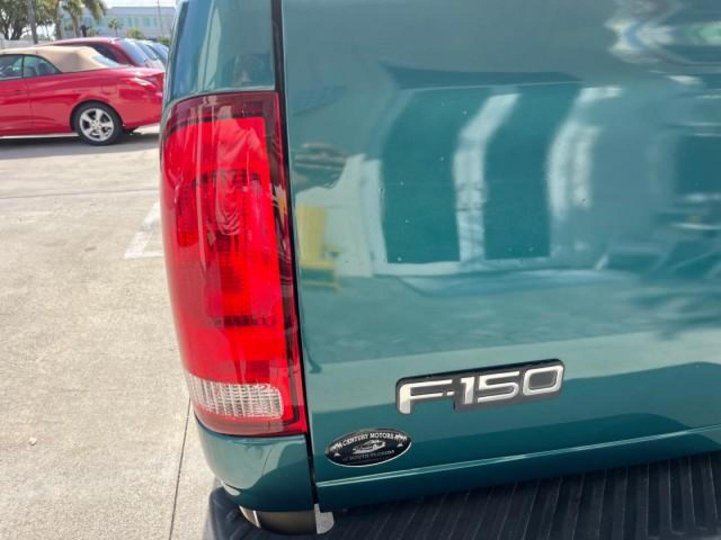 1998 Pacific Green (CC/Met) /Medium Prarie Tan Ford F-150 1 FL Lariat LOW MILES 78,833 (1FTZX1763WN) with an 4.6L EFI OHC V8 Triton Engine engine, Automatic transmission, located at 4701 North Dixie Hwy, Pompano Beach, FL, 33064, (954) 422-2889, 26.240938, -80.123474 - 1998 FORD F-150 ROAD READY 4.6L V8 VIN: 1FTZX1763WNB09132 1 OWNER FLORIDA 3 DOOR EXTENDED CAB PICKUP NO RECALLS 4.6L V8 F LOW MILES 78,833 GASOLINE 6.6 FT BED POWER LEATHER SEATS REAR WHEEL DRIVE POWER MIRRORS 8 SERVICE RECORDS THIS IS ONE OF THE NICEST FORD F-150 WE HAVE EVER LISTED RETIREE FLORIDA - Photo#80