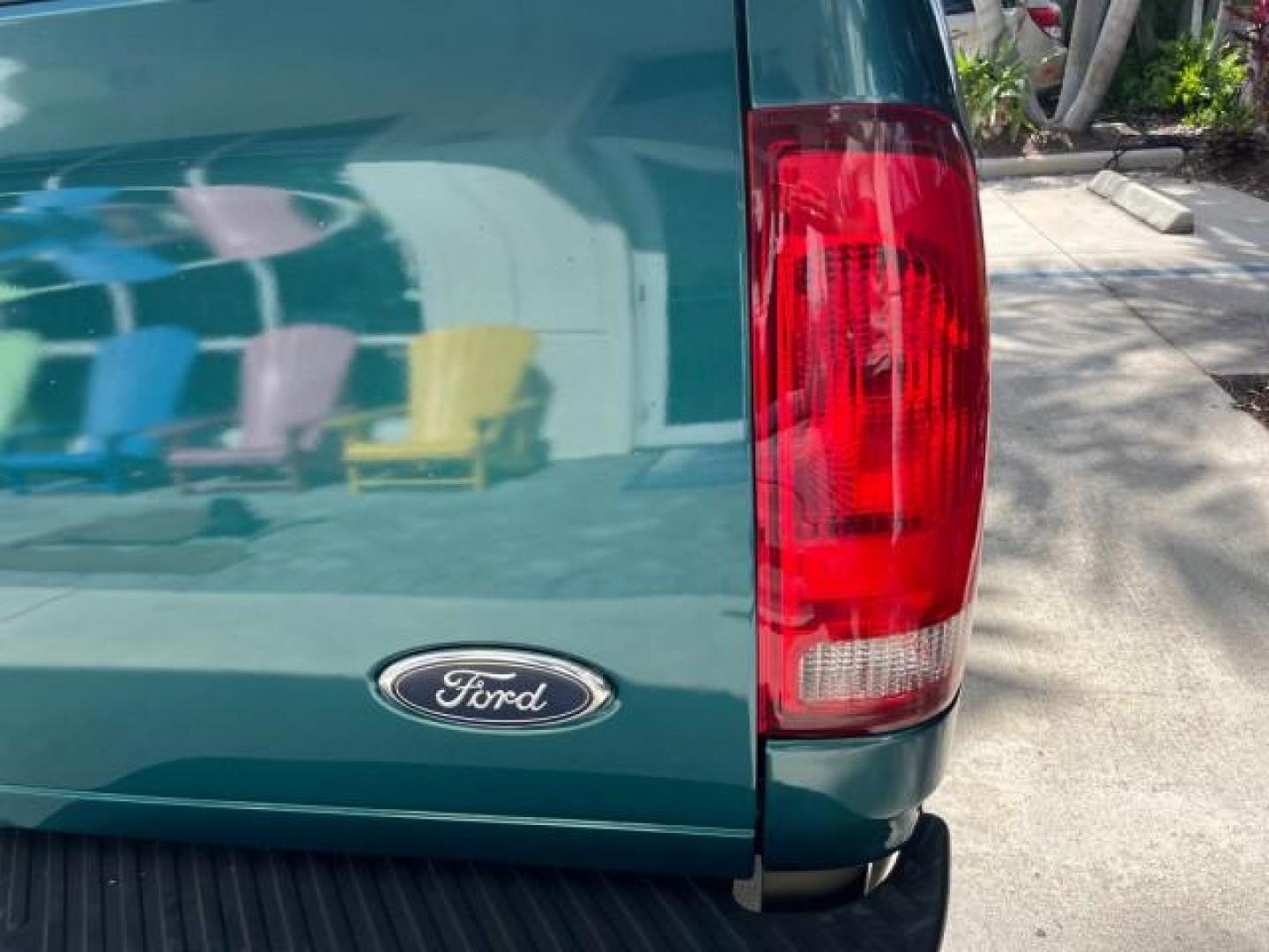 1998 Pacific Green (CC/Met) /Medium Prarie Tan Ford F-150 1 FL Lariat LOW MILES 78,833 (1FTZX1763WN) with an 4.6L EFI OHC V8 Triton Engine engine, Automatic transmission, located at 4701 North Dixie Hwy, Pompano Beach, FL, 33064, (954) 422-2889, 26.240938, -80.123474 - 1998 FORD F-150 ROAD READY 4.6L V8 VIN: 1FTZX1763WNB09132 1 OWNER FLORIDA 3 DOOR EXTENDED CAB PICKUP NO RECALLS 4.6L V8 F LOW MILES 78,833 GASOLINE 6.6 FT BED POWER LEATHER SEATS REAR WHEEL DRIVE POWER MIRRORS 8 SERVICE RECORDS THIS IS ONE OF THE NICEST FORD F-150 WE HAVE EVER LISTED RETIREE FLORIDA - Photo#81