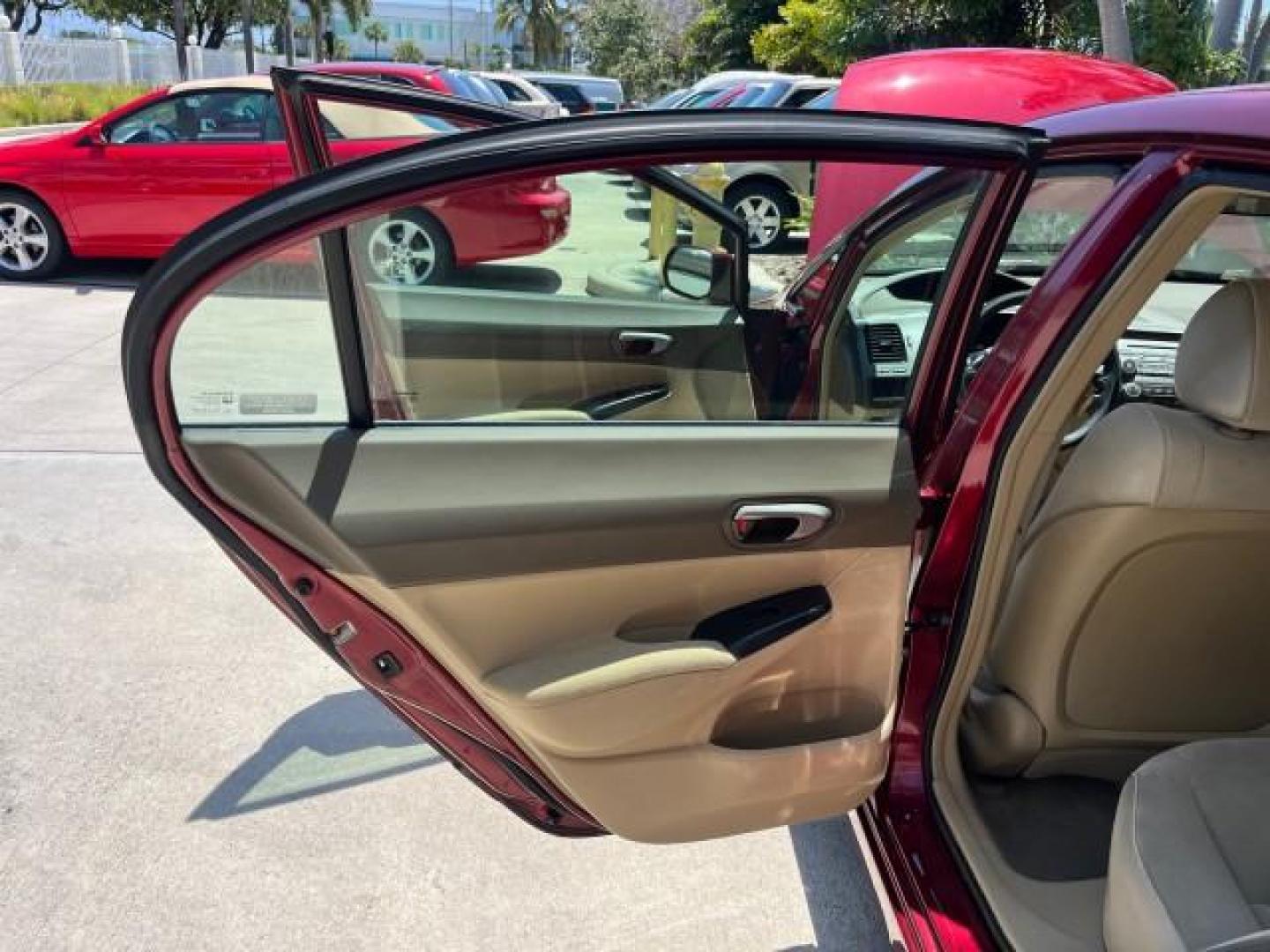 2008 Tango Red Pearl /Ivory Honda Civic Sdn LX LOW MILES 43,458 (1HGFA165X8L) with an 1.8L SOHC MPFI 16-Valve i-VTEC I4 Engine engine, Automatic transmission, located at 4701 North Dixie Hwy, Pompano Beach, FL, 33064, (954) 422-2889, 26.240938, -80.123474 - OUR WEBPAGE FLORIDACARS1.COM HAS OVER 100 PHOTOS AND FREE CARFAX LINK 2008 HONDA CIVIC LX ROAD READY 1.8L I4 VIN: 1HGFA165X8L021109 NO RECALLS 40 MPG SEDAN 4 DR LOW MILES 43,458 1.8L I4 F SOHC 16V 12 SERVICE RECORDS GASOLINE FLORIDA OWNER FRONT WHEEL DRIVE POWER MIRRORS Anti-Theft System Cruise Cont - Photo#13