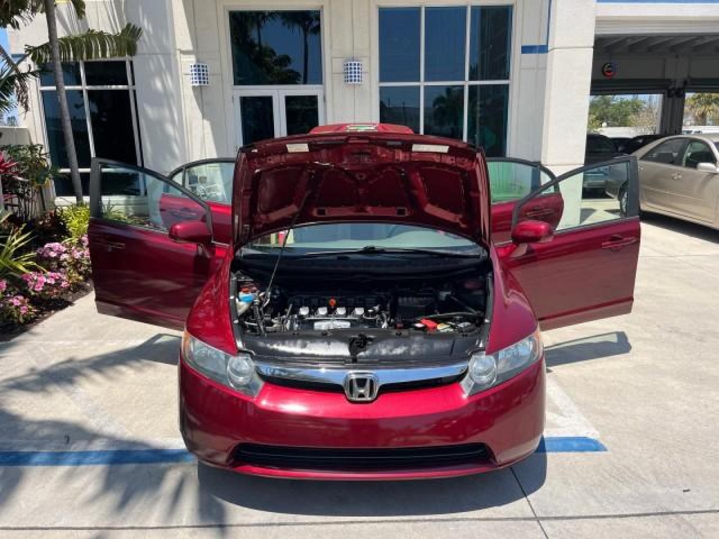 2008 Tango Red Pearl /Ivory Honda Civic Sdn LX LOW MILES 43,458 (1HGFA165X8L) with an 1.8L SOHC MPFI 16-Valve i-VTEC I4 Engine engine, Automatic transmission, located at 4701 North Dixie Hwy, Pompano Beach, FL, 33064, (954) 422-2889, 26.240938, -80.123474 - OUR WEBPAGE FLORIDACARS1.COM HAS OVER 100 PHOTOS AND FREE CARFAX LINK 2008 HONDA CIVIC LX ROAD READY 1.8L I4 VIN: 1HGFA165X8L021109 NO RECALLS 40 MPG SEDAN 4 DR LOW MILES 43,458 1.8L I4 F SOHC 16V 12 SERVICE RECORDS GASOLINE FLORIDA OWNER FRONT WHEEL DRIVE POWER MIRRORS Anti-Theft System Cruise Cont - Photo#16