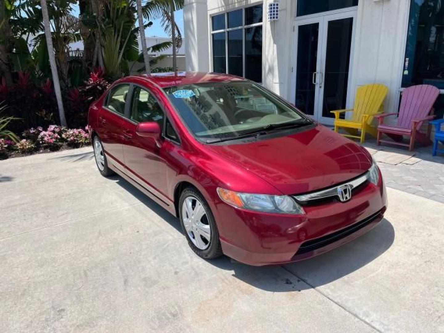 2008 Tango Red Pearl /Ivory Honda Civic Sdn LX LOW MILES 43,458 (1HGFA165X8L) with an 1.8L SOHC MPFI 16-Valve i-VTEC I4 Engine engine, Automatic transmission, located at 4701 North Dixie Hwy, Pompano Beach, FL, 33064, (954) 422-2889, 26.240938, -80.123474 - OUR WEBPAGE FLORIDACARS1.COM HAS OVER 100 PHOTOS AND FREE CARFAX LINK 2008 HONDA CIVIC LX ROAD READY 1.8L I4 VIN: 1HGFA165X8L021109 NO RECALLS 40 MPG SEDAN 4 DR LOW MILES 43,458 1.8L I4 F SOHC 16V 12 SERVICE RECORDS GASOLINE FLORIDA OWNER FRONT WHEEL DRIVE POWER MIRRORS Anti-Theft System Cruise Cont - Photo#1