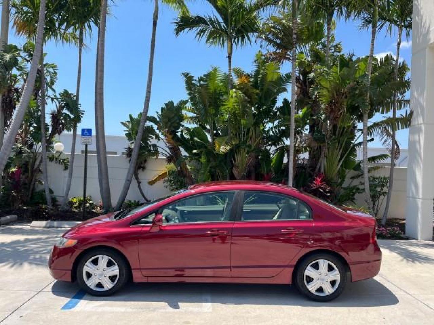 2008 Tango Red Pearl /Ivory Honda Civic Sdn LX LOW MILES 43,458 (1HGFA165X8L) with an 1.8L SOHC MPFI 16-Valve i-VTEC I4 Engine engine, Automatic transmission, located at 4701 North Dixie Hwy, Pompano Beach, FL, 33064, (954) 422-2889, 26.240938, -80.123474 - OUR WEBPAGE FLORIDACARS1.COM HAS OVER 100 PHOTOS AND FREE CARFAX LINK 2008 HONDA CIVIC LX ROAD READY 1.8L I4 VIN: 1HGFA165X8L021109 NO RECALLS 40 MPG SEDAN 4 DR LOW MILES 43,458 1.8L I4 F SOHC 16V 12 SERVICE RECORDS GASOLINE FLORIDA OWNER FRONT WHEEL DRIVE POWER MIRRORS Anti-Theft System Cruise Cont - Photo#4