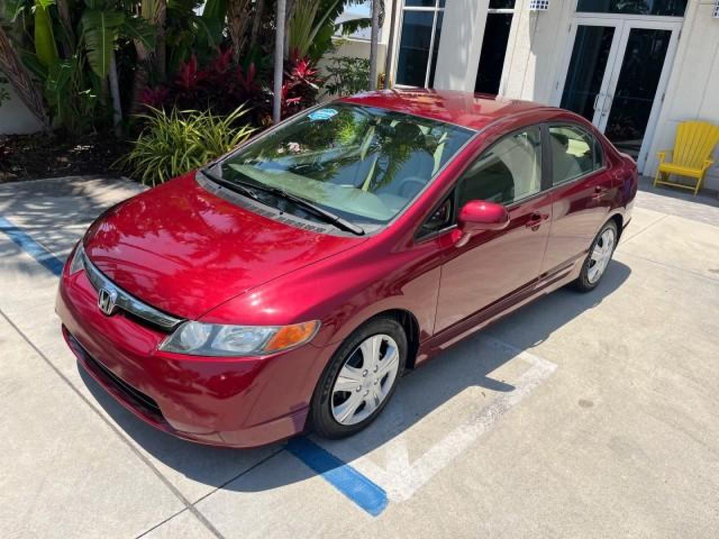 2008 Tango Red Pearl /Ivory Honda Civic Sdn LX LOW MILES 43,458 (1HGFA165X8L) with an 1.8L SOHC MPFI 16-Valve i-VTEC I4 Engine engine, Automatic transmission, located at 4701 North Dixie Hwy, Pompano Beach, FL, 33064, (954) 422-2889, 26.240938, -80.123474 - OUR WEBPAGE FLORIDACARS1.COM HAS OVER 100 PHOTOS AND FREE CARFAX LINK 2008 HONDA CIVIC LX ROAD READY 1.8L I4 VIN: 1HGFA165X8L021109 NO RECALLS 40 MPG SEDAN 4 DR LOW MILES 43,458 1.8L I4 F SOHC 16V 12 SERVICE RECORDS GASOLINE FLORIDA OWNER FRONT WHEEL DRIVE POWER MIRRORS Anti-Theft System Cruise Cont - Photo#69