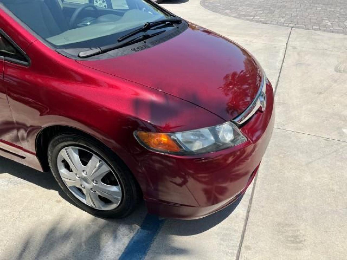 2008 Tango Red Pearl /Ivory Honda Civic Sdn LX LOW MILES 43,458 (1HGFA165X8L) with an 1.8L SOHC MPFI 16-Valve i-VTEC I4 Engine engine, Automatic transmission, located at 4701 North Dixie Hwy, Pompano Beach, FL, 33064, (954) 422-2889, 26.240938, -80.123474 - OUR WEBPAGE FLORIDACARS1.COM HAS OVER 100 PHOTOS AND FREE CARFAX LINK 2008 HONDA CIVIC LX ROAD READY 1.8L I4 VIN: 1HGFA165X8L021109 NO RECALLS 40 MPG SEDAN 4 DR LOW MILES 43,458 1.8L I4 F SOHC 16V 12 SERVICE RECORDS GASOLINE FLORIDA OWNER FRONT WHEEL DRIVE POWER MIRRORS Anti-Theft System Cruise Cont - Photo#71