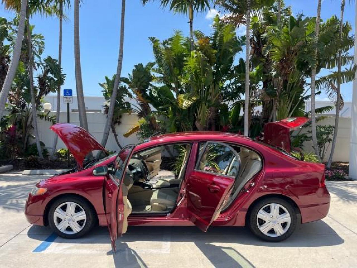 2008 Tango Red Pearl /Ivory Honda Civic Sdn LX LOW MILES 43,458 (1HGFA165X8L) with an 1.8L SOHC MPFI 16-Valve i-VTEC I4 Engine engine, Automatic transmission, located at 4701 North Dixie Hwy, Pompano Beach, FL, 33064, (954) 422-2889, 26.240938, -80.123474 - OUR WEBPAGE FLORIDACARS1.COM HAS OVER 100 PHOTOS AND FREE CARFAX LINK 2008 HONDA CIVIC LX ROAD READY 1.8L I4 VIN: 1HGFA165X8L021109 NO RECALLS 40 MPG SEDAN 4 DR LOW MILES 43,458 1.8L I4 F SOHC 16V 12 SERVICE RECORDS GASOLINE FLORIDA OWNER FRONT WHEEL DRIVE POWER MIRRORS Anti-Theft System Cruise Cont - Photo#8