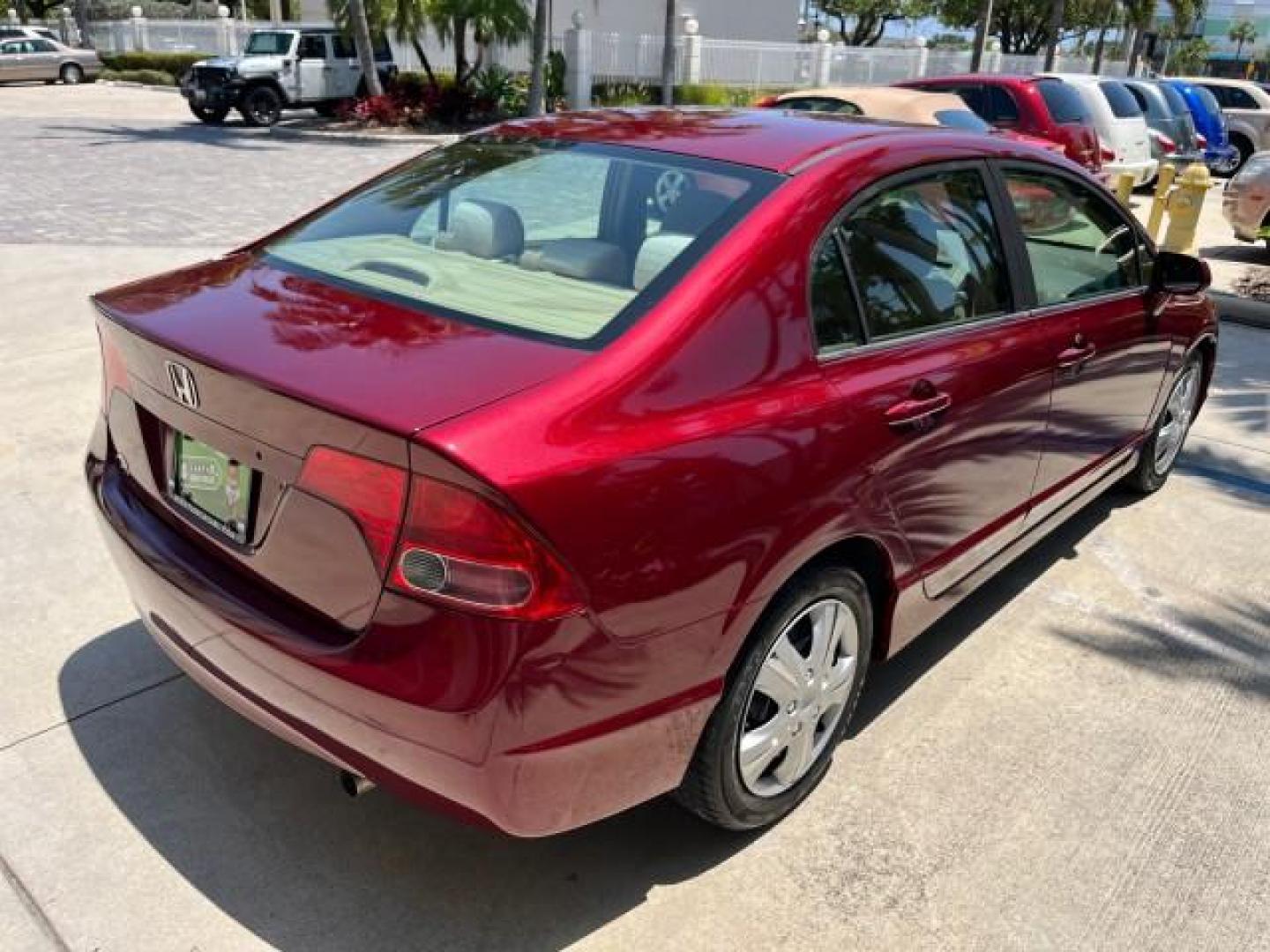 2008 Tango Red Pearl /Ivory Honda Civic Sdn LX LOW MILES 43,458 (1HGFA165X8L) with an 1.8L SOHC MPFI 16-Valve i-VTEC I4 Engine engine, Automatic transmission, located at 4701 North Dixie Hwy, Pompano Beach, FL, 33064, (954) 422-2889, 26.240938, -80.123474 - OUR WEBPAGE FLORIDACARS1.COM HAS OVER 100 PHOTOS AND FREE CARFAX LINK 2008 HONDA CIVIC LX ROAD READY 1.8L I4 VIN: 1HGFA165X8L021109 NO RECALLS 40 MPG SEDAN 4 DR LOW MILES 43,458 1.8L I4 F SOHC 16V 12 SERVICE RECORDS GASOLINE FLORIDA OWNER FRONT WHEEL DRIVE POWER MIRRORS Anti-Theft System Cruise Cont - Photo#89