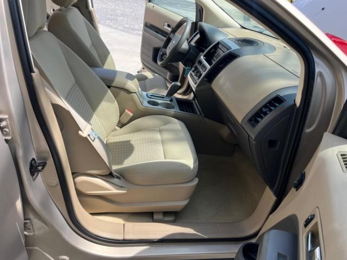 2007 Dune Pearl Metallic /Camel Ford Edge SE LOW MILES 80,423 (2FMDK36C37B) with an 3.5L V6 Duratec Engine engine, Automatic transmission, located at 4701 North Dixie Hwy, Pompano Beach, FL, 33064, (954) 422-2889, 26.240938, -80.123474 - OUR WEBPAGE FLORIDACARS1.COM HAS OVER 100 PHOTOS AND FREE CARFAX LINK 2007 FORD EDGE SE ROAD READY 3.5L V6 VIN: 2FMDK36C37BB66905 FLORIDA OWNER 4 DOOR WAGON/SPORT UTILITY LOW MILES 80,423 3.5L V6 F 15 SERVICE RECORDS GASOLINE VERY CLEAN FRONT WHEEL DRIVE NEW LIKE TIRES Alloy Shift Knob Anti-Theft Sy - Photo#12