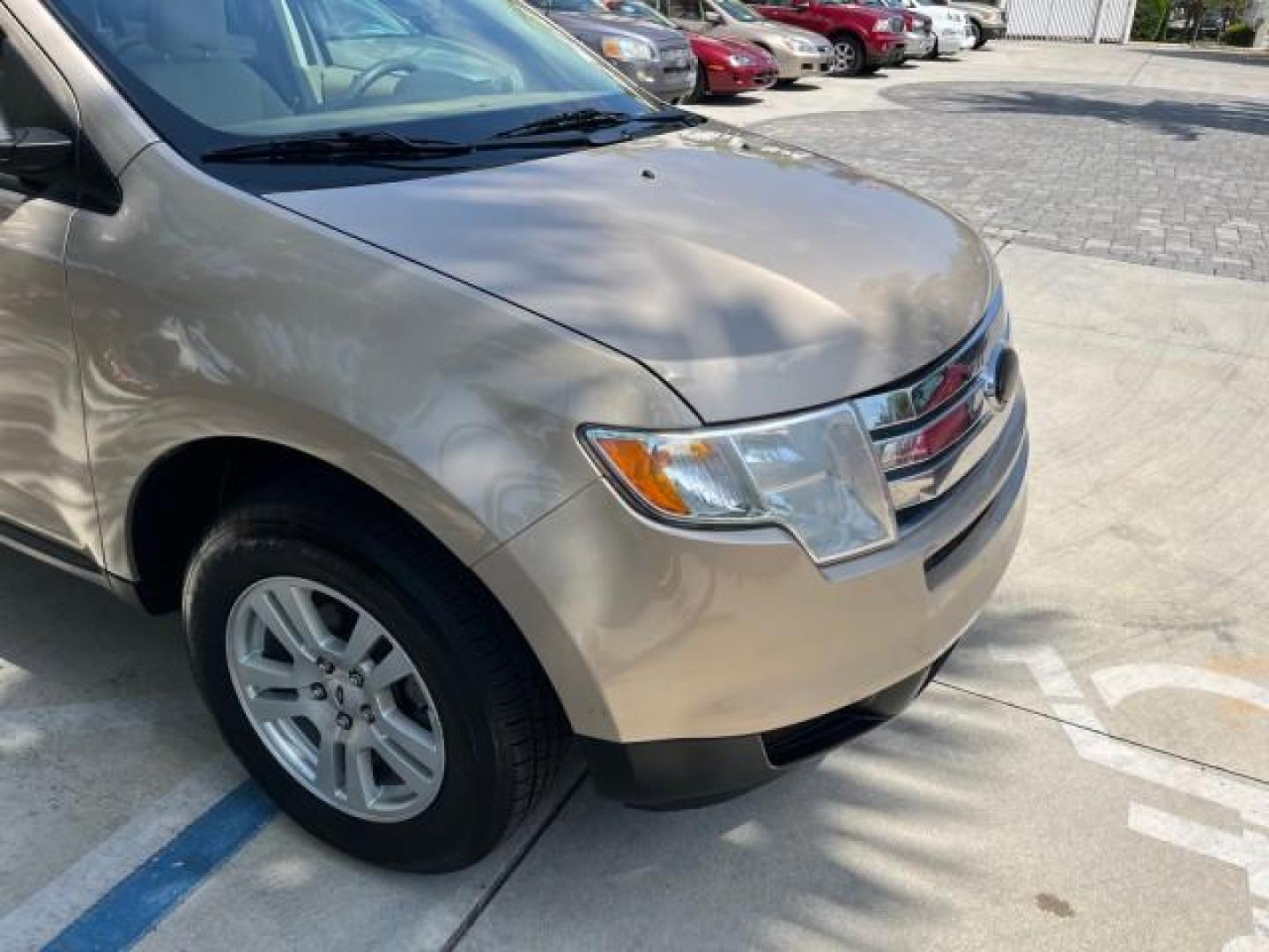 2007 Dune Pearl Metallic /Camel Ford Edge SE LOW MILES 80,423 (2FMDK36C37B) with an 3.5L V6 Duratec Engine engine, Automatic transmission, located at 4701 North Dixie Hwy, Pompano Beach, FL, 33064, (954) 422-2889, 26.240938, -80.123474 - OUR WEBPAGE FLORIDACARS1.COM HAS OVER 100 PHOTOS AND FREE CARFAX LINK 2007 FORD EDGE SE ROAD READY 3.5L V6 VIN: 2FMDK36C37BB66905 FLORIDA OWNER 4 DOOR WAGON/SPORT UTILITY LOW MILES 80,423 3.5L V6 F 15 SERVICE RECORDS GASOLINE VERY CLEAN FRONT WHEEL DRIVE NEW LIKE TIRES Alloy Shift Knob Anti-Theft Sy - Photo#82