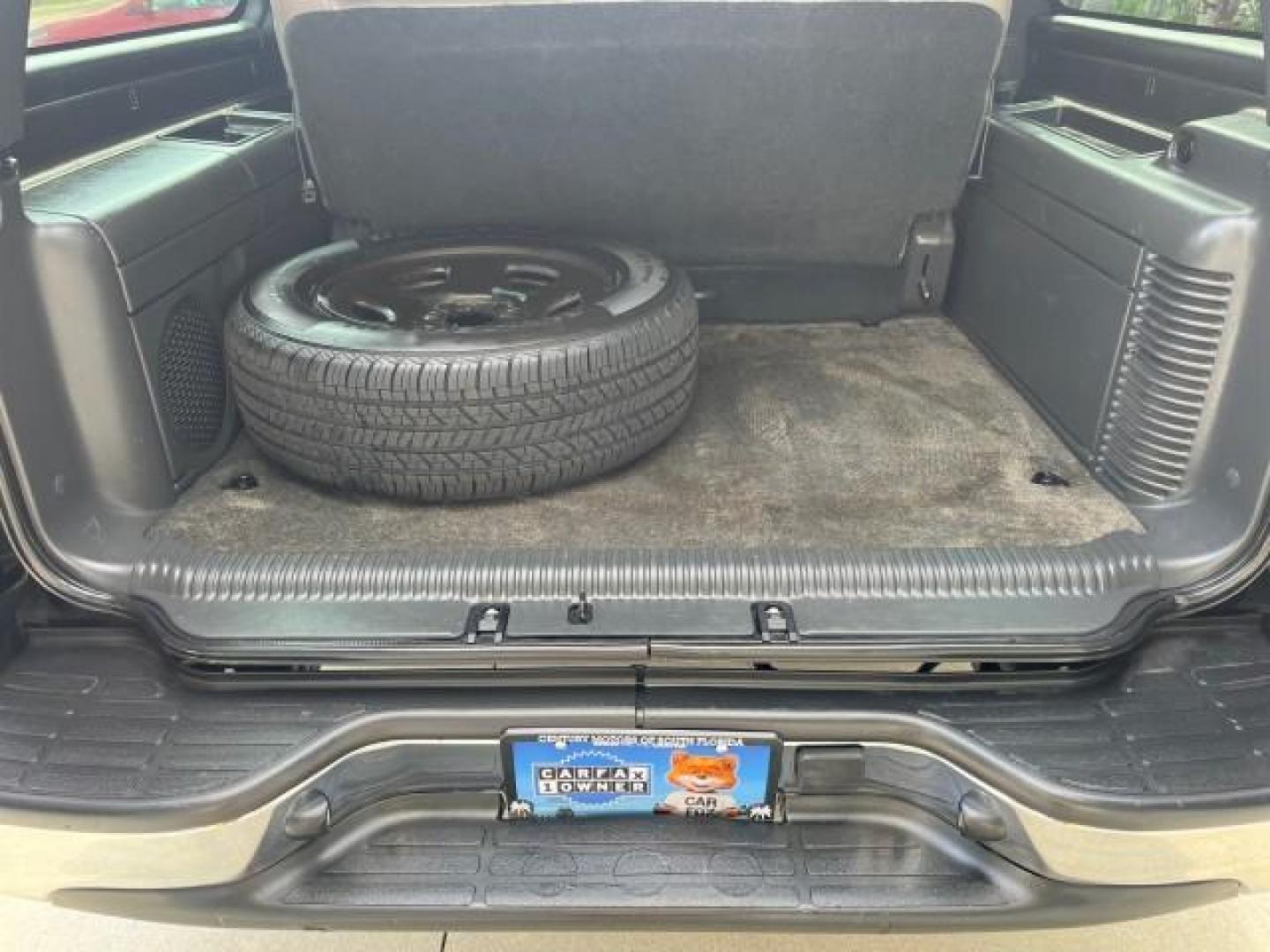 2002 Onyx Black /Gpht/Med Gray Chevrolet Suburban 1 FL LT LOW MILES 99,577 (1GNEC16ZX2J) with an 5.3L Vortec 1000 SFI V8 E-85 Ethanol Flex-Fuel Compatible Engine engine, Automatic transmission, located at 4701 North Dixie Hwy, Pompano Beach, FL, 33064, (954) 422-2889, 26.240938, -80.123474 - 2002 CHEVROLET SUBURBAN 1500 LS ROAD READY 5.3L V8 VIN: 1GNEC16ZX2J252349 NO RECALLS 4 DOOR WAGON/SPORT UTILITY POWER LEATHER SEATS 5.3L V8 F 3 ROW SEATS FLEX FUEL LOADED 1 OWNER FLORIDA REAR WHEEL DRIVE LOW MILES 99,577 POWER SUNROOF Alloy Wheels Anti-Theft System Approach Lights Auto-dimming Rearv - Photo#73