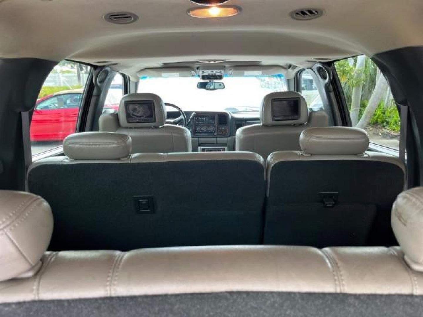 2002 Onyx Black /Gpht/Med Gray Chevrolet Suburban 1 FL LT LOW MILES 99,577 (1GNEC16ZX2J) with an 5.3L Vortec 1000 SFI V8 E-85 Ethanol Flex-Fuel Compatible Engine engine, Automatic transmission, located at 4701 North Dixie Hwy, Pompano Beach, FL, 33064, (954) 422-2889, 26.240938, -80.123474 - 2002 CHEVROLET SUBURBAN 1500 LS ROAD READY 5.3L V8 VIN: 1GNEC16ZX2J252349 NO RECALLS 4 DOOR WAGON/SPORT UTILITY POWER LEATHER SEATS 5.3L V8 F 3 ROW SEATS FLEX FUEL LOADED 1 OWNER FLORIDA REAR WHEEL DRIVE LOW MILES 99,577 POWER SUNROOF Alloy Wheels Anti-Theft System Approach Lights Auto-dimming Rearv - Photo#76