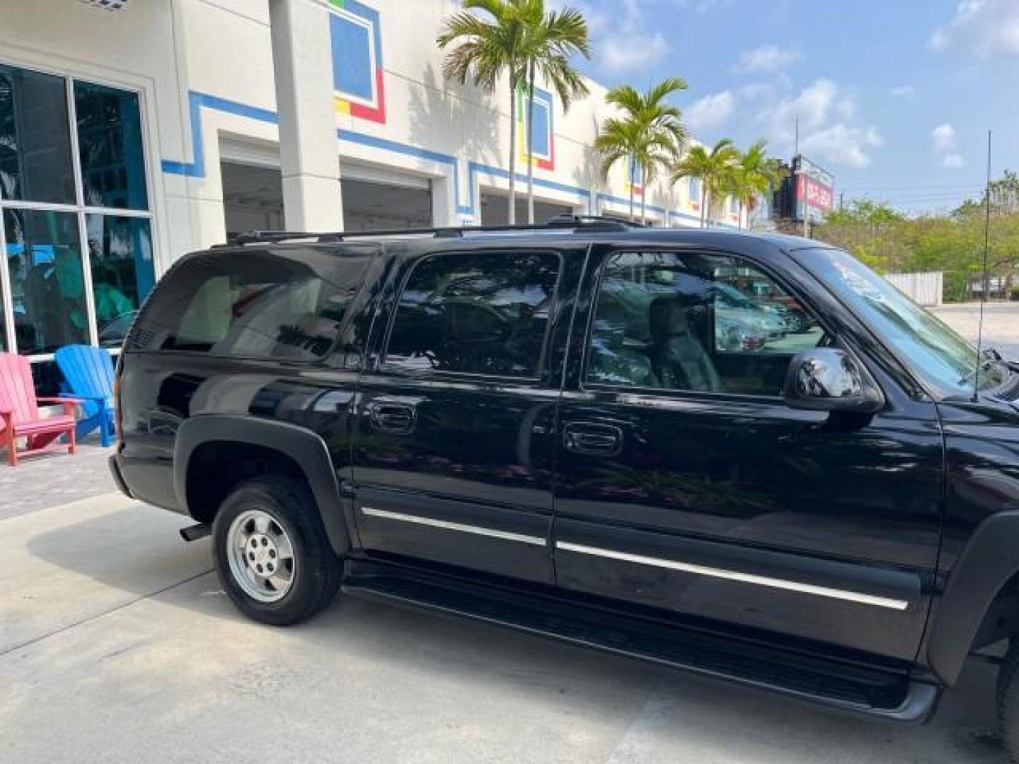 2002 Onyx Black /Gpht/Med Gray Chevrolet Suburban 1 FL LT LOW MILES 99,577 (1GNEC16ZX2J) with an 5.3L Vortec 1000 SFI V8 E-85 Ethanol Flex-Fuel Compatible Engine engine, Automatic transmission, located at 4701 North Dixie Hwy, Pompano Beach, FL, 33064, (954) 422-2889, 26.240938, -80.123474 - 2002 CHEVROLET SUBURBAN 1500 LS ROAD READY 5.3L V8 VIN: 1GNEC16ZX2J252349 NO RECALLS 4 DOOR WAGON/SPORT UTILITY POWER LEATHER SEATS 5.3L V8 F 3 ROW SEATS FLEX FUEL LOADED 1 OWNER FLORIDA REAR WHEEL DRIVE LOW MILES 99,577 POWER SUNROOF Alloy Wheels Anti-Theft System Approach Lights Auto-dimming Rearv - Photo#97