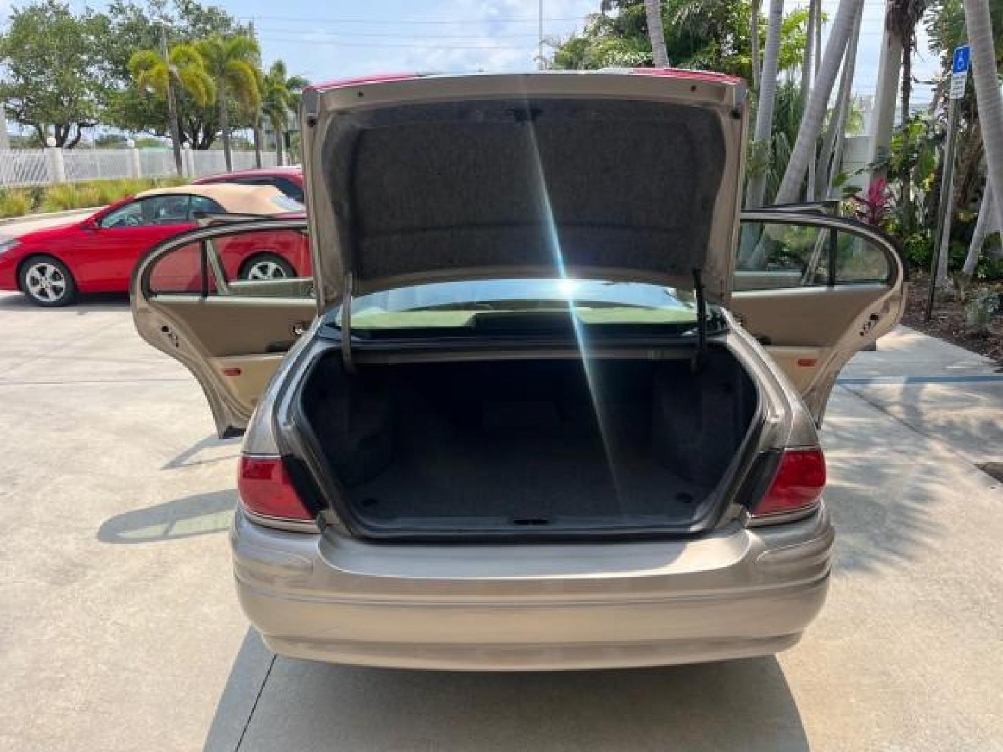 2004 Light Bronzemist Metallic /Light Cashmere Buick LeSabre 1 FL Limited LOW MILES 50,531 (1G4HR54K244) with an 3.8L 3800 V6 SFI Engine engine, Automatic transmission, located at 4701 North Dixie Hwy, Pompano Beach, FL, 33064, (954) 422-2889, 26.240938, -80.123474 - OUR WEBPAGE FLORIDACARS1.COM HAS OVER 100 PHOTOS AND FREE CARFAX LINK 2004 BUICK LESABRE LIMITED ROAD READY 3.8L V6 VIN: 1G4HR54K244135105 NO ACCIDENTS NO RECALLS SEDAN 4 DR 1 OWNER FLORIDA 3.8L V6 F OHV POWER LEATHER SEATS GASOLINE DUAL AC LOW MILES 50,531 FRONT WHEEL DRIVE LIMITED 8 SERVICE RECORD - Photo#15