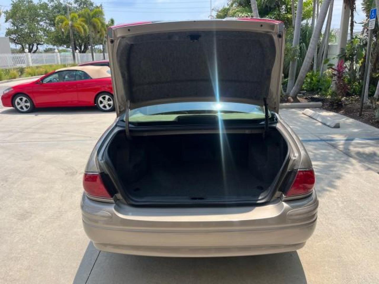 2004 Light Bronzemist Metallic /Light Cashmere Buick LeSabre 1 FL Limited LOW MILES 50,531 (1G4HR54K244) with an 3.8L 3800 V6 SFI Engine engine, Automatic transmission, located at 4701 North Dixie Hwy, Pompano Beach, FL, 33064, (954) 422-2889, 26.240938, -80.123474 - OUR WEBPAGE FLORIDACARS1.COM HAS OVER 100 PHOTOS AND FREE CARFAX LINK 2004 BUICK LESABRE LIMITED ROAD READY 3.8L V6 VIN: 1G4HR54K244135105 NO ACCIDENTS NO RECALLS SEDAN 4 DR 1 OWNER FLORIDA 3.8L V6 F OHV POWER LEATHER SEATS GASOLINE DUAL AC LOW MILES 50,531 FRONT WHEEL DRIVE LIMITED 8 SERVICE RECORD - Photo#59