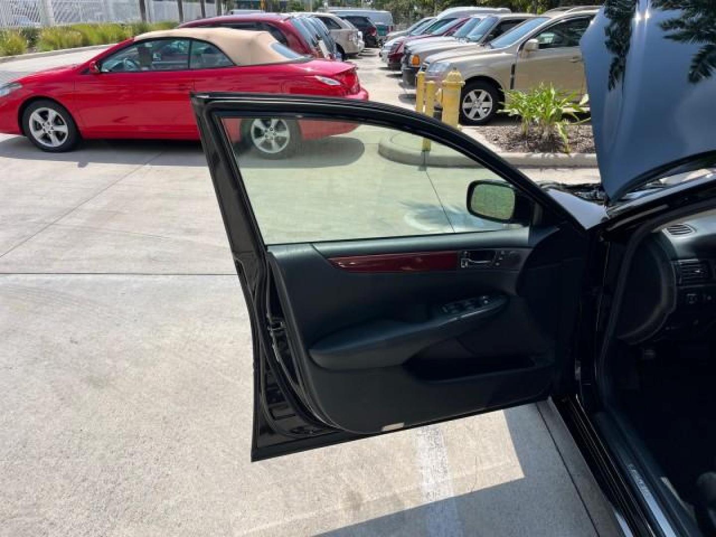 2002 Black Onyx /Black Lexus ES 300 LOW MILES 38,782 (JTHBF30G825) with an 3.0L DOHC EFI 24-Valve V6 Aluminum Engine engine, Automatic transmission, located at 4701 North Dixie Hwy, Pompano Beach, FL, 33064, (954) 422-2889, 26.240938, -80.123474 - 2002 LEXUS ES 300 ROAD READY 3.0L V6 VIN: JTHBF30G825021401 NO RECALLS 29 MPG SEDAN 4 DR FLORIDA OWNER 3.0L V6 F DOHC 24V LOW MILES 38,782 GASOLINE 35 SERVICE RECORDS FRONT WHEEL DRIVE POWER SUNROOF POWER LEATHER SEATS Alloy Wheels Anti-Theft System Approach Lights Auto-dimming Rearview Mirror Autom - Photo#9